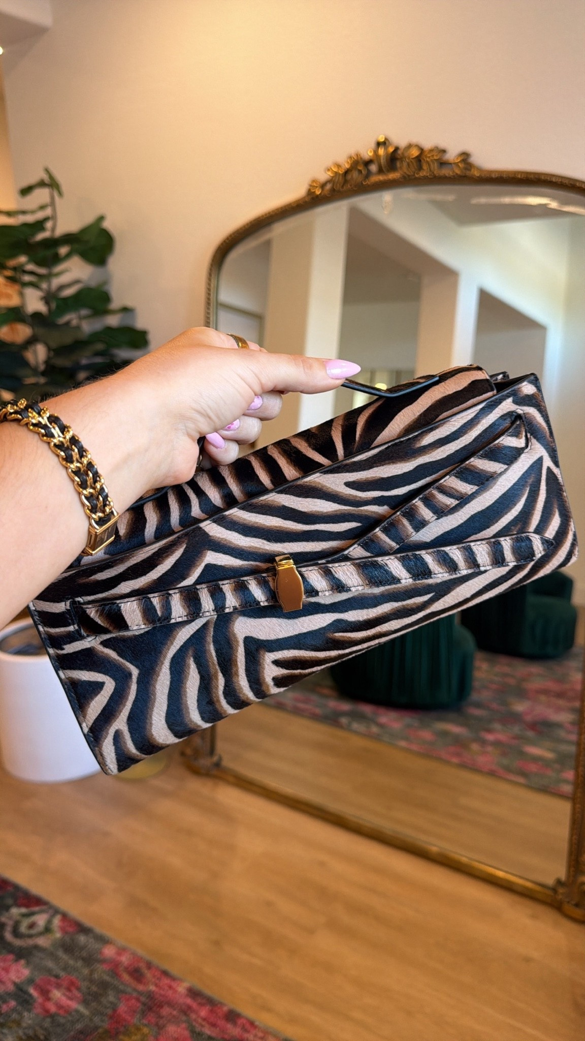 the most perfect calf hair zebra tiger clutch! fits a phone and much more! come with a strap too