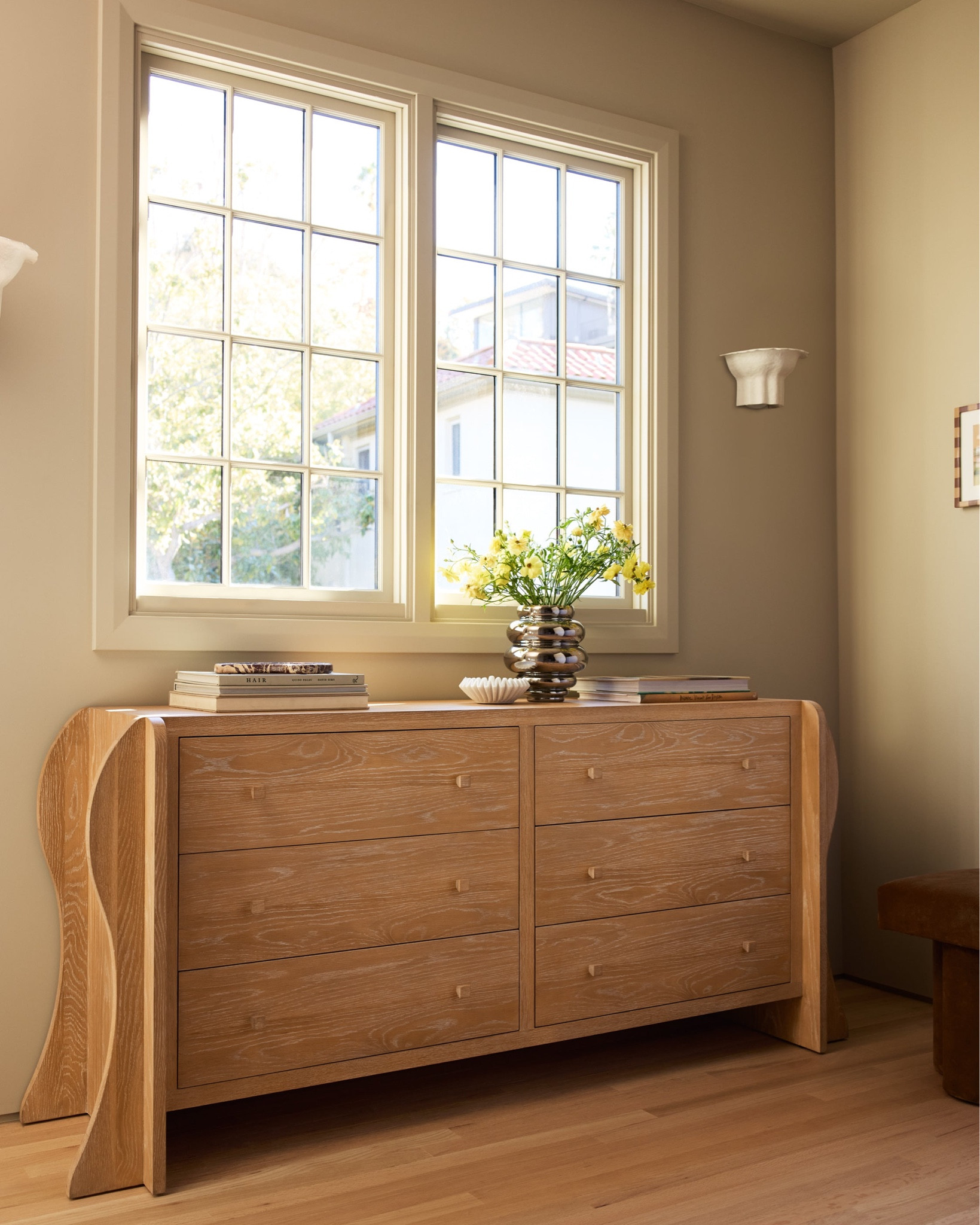 The Hourglass dresser brings a sculptural edge to bedroom storage. Shapely legs bolster the generous case with an artful line that folds into your room with quiet impact. 

#LTKHome