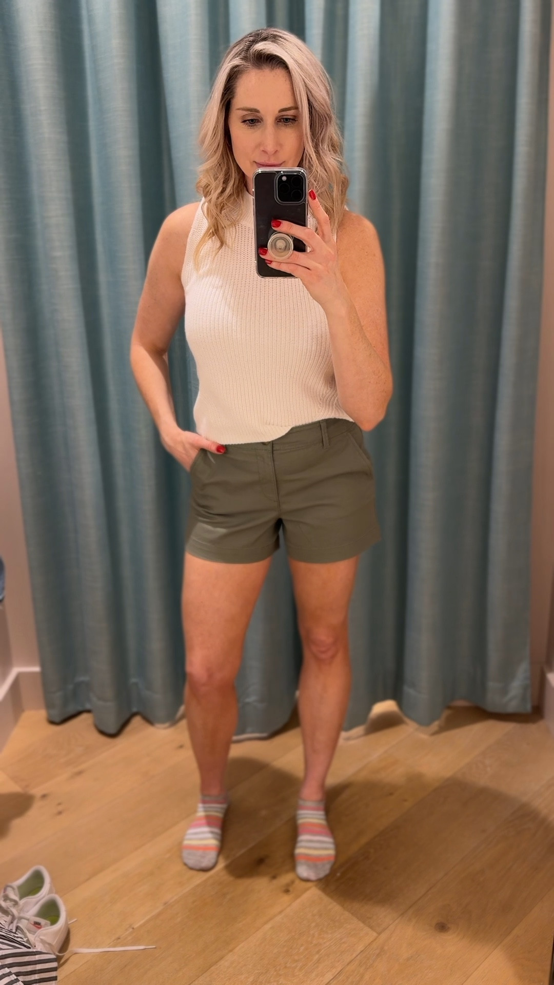 Light Weight Sleeveless Sweater + Shorts 

This spring sweater is light and breathable. I’m 5’9 and wearing a small top and size 4 shorts  