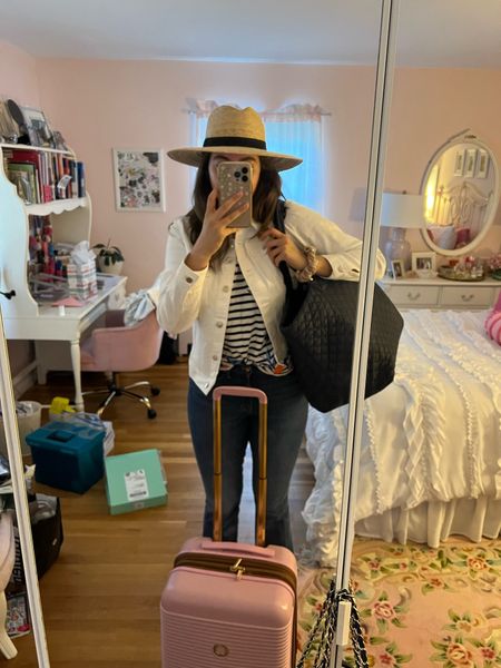 Travel outfit, travel day, suitcase, carryon suitcase, mz Wallace, tote bag, jeans, flare jeans, striped shirt, straw hat, white denim jacket, white jean jacket

#LTKtravel #LTKSeasonal #LTKunder100