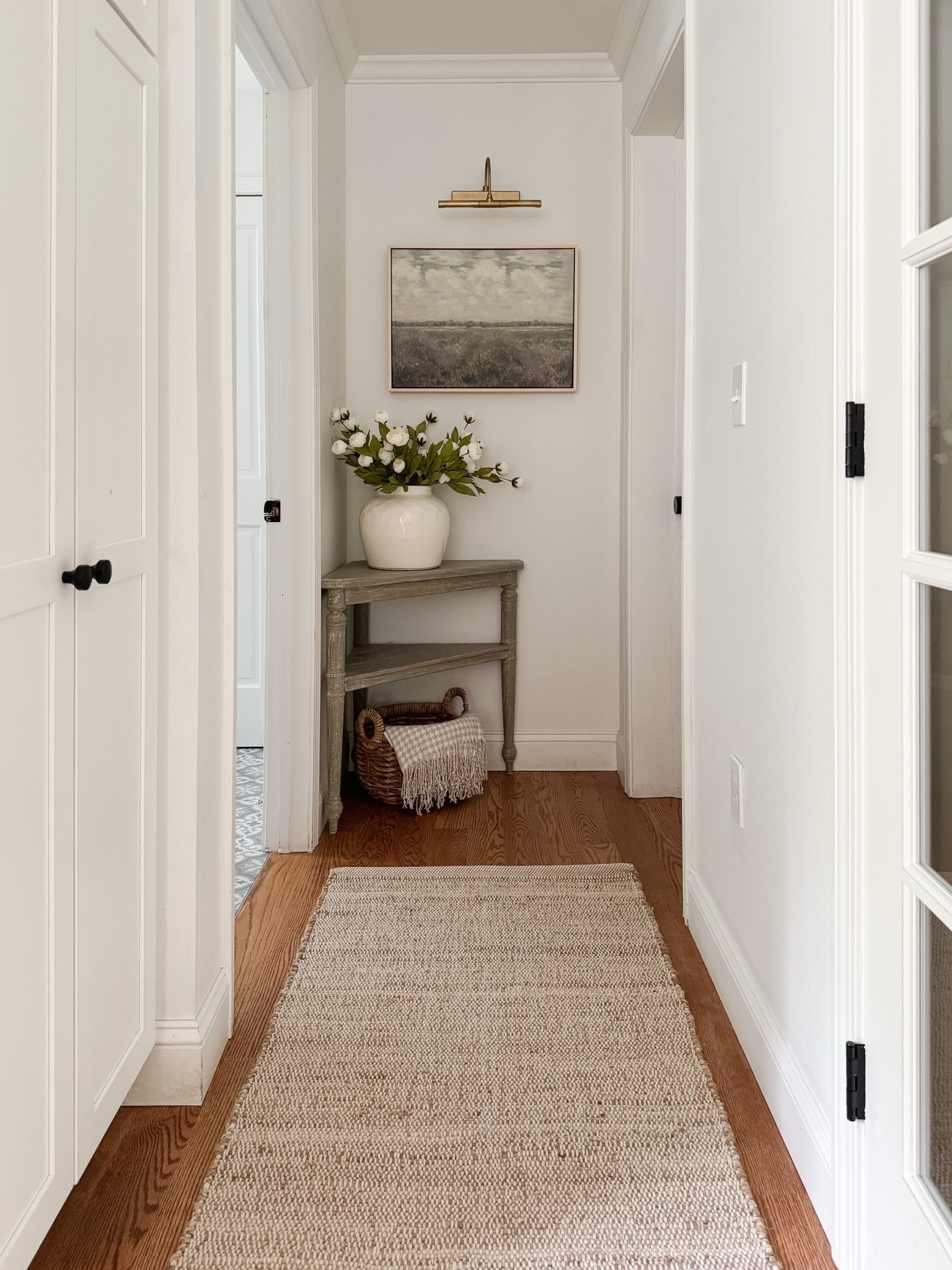 Spruce up a little corner in your home with these decor ideas! Adding a small table, faux florals, and some artwork can go a long way. I love this new runner from Amazon and think it fits perfectly in this nook. Linking everything here!

#LTKHome