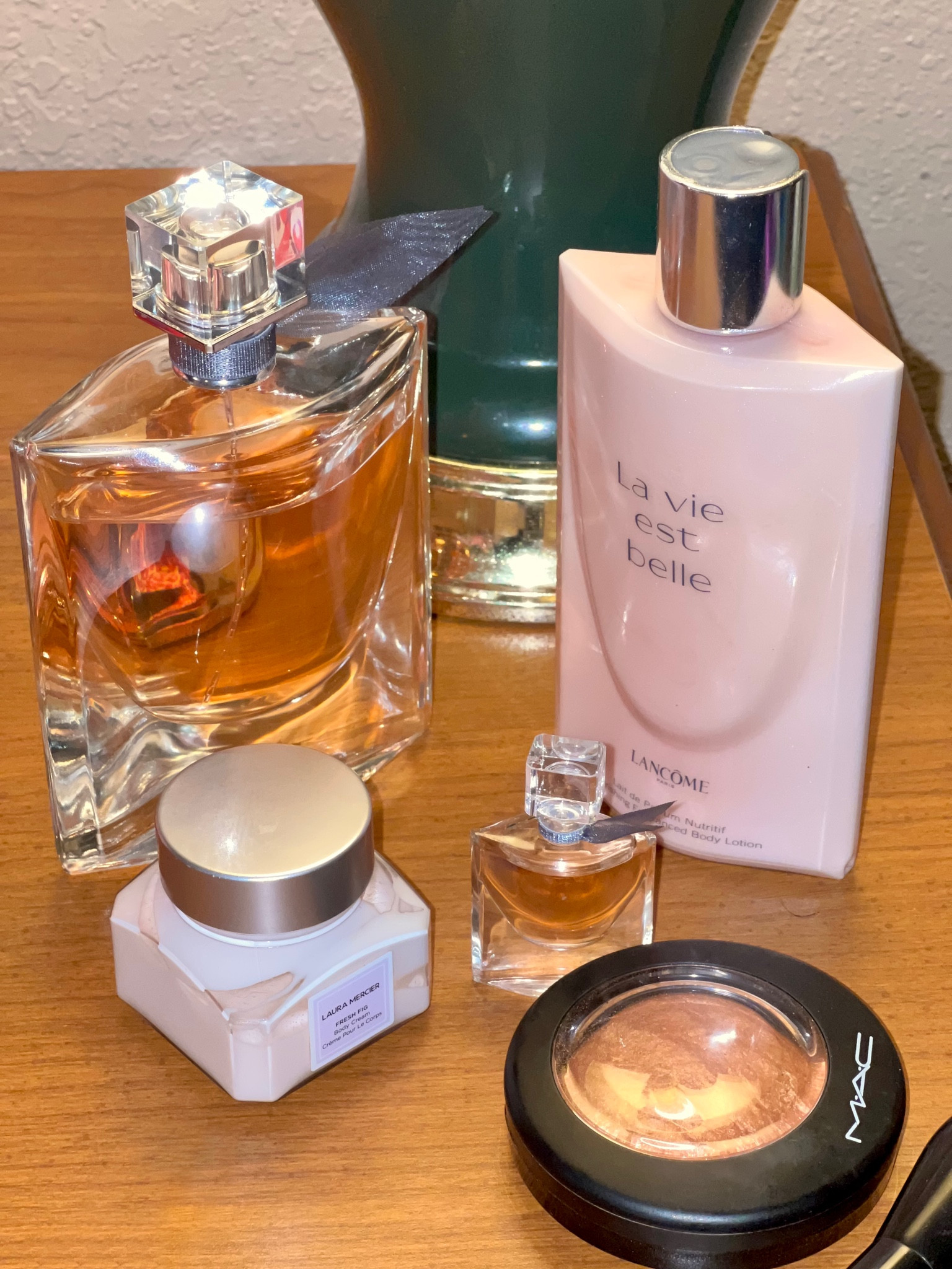 Fragrance is the first layer of dressing, a woman’s invisible bodysuit. 
Lancôme’s La vie est belle is one of my faves. Add it to your fragrance collection. You’d always restock   
MAC Cosmetics gold deposit is that finishing touch for your skin. 
Another one of my faves is the Laura Mercier body suffle that keeps your skin soft and well moisturized  

#LTKbeauty #LTKFind