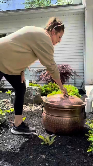 I love these vintage-style garden hose containers. It is a great way to store away and hide your garden hose aesthetically.  

 #LTKSeasonal #LTKHome