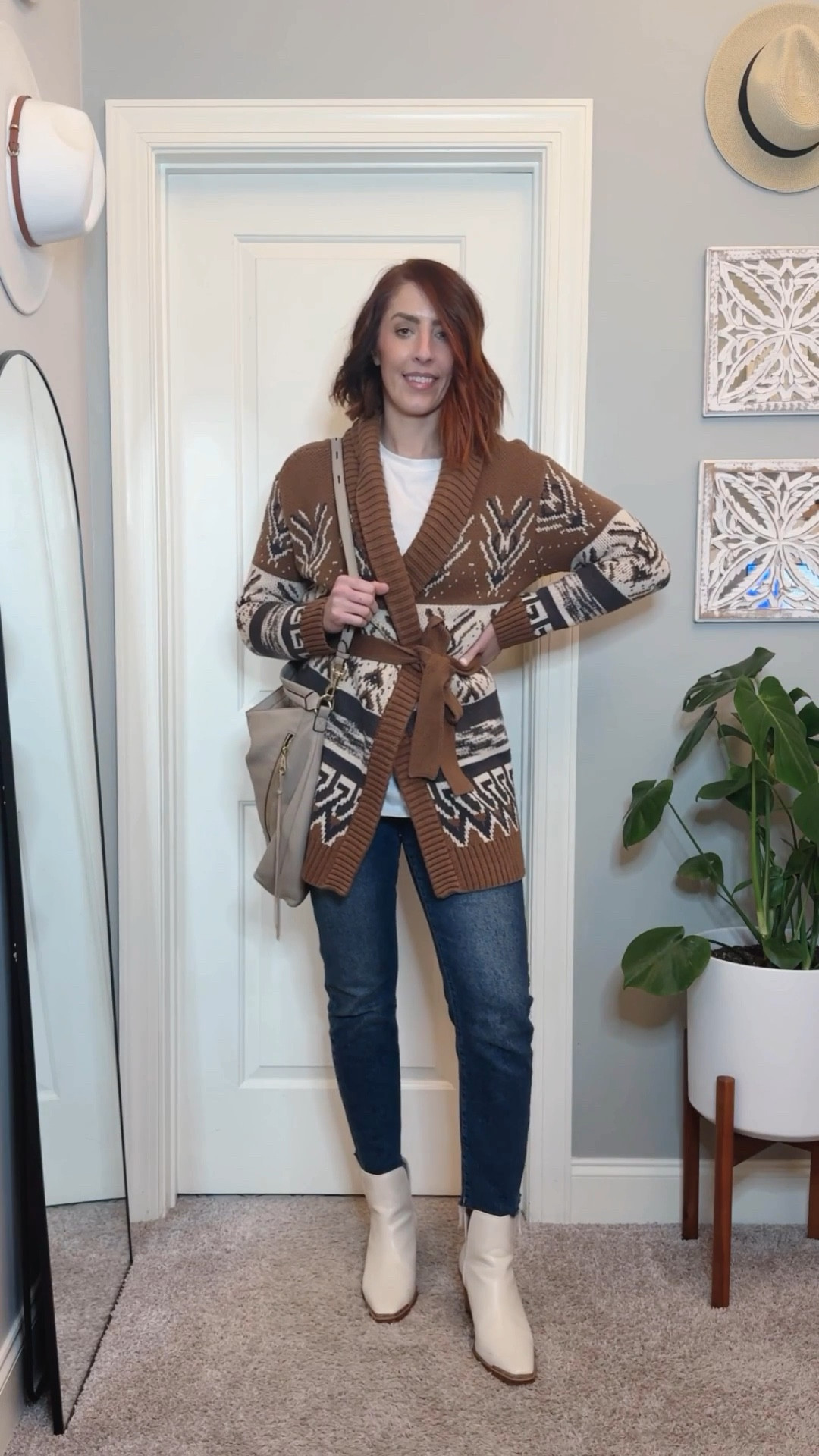 Which pattern speaks to your soul—stripes, geometrics, or something else entirely?

Day 22 of my 31 Days of Closet Magic Challenge has me channeling Southwestern vibes in a neutral, patterned way. 

I paired an oversized white long sleeve tunic shirt with a cozy, western-inspired belted cardigan duster, cropped straight-leg jeans, modern white western booties, and my go-to beige hobo bag. 

This look proves that neutral tones can still make a statement when texture and patterns take the spotlight. 

Perfect for a casual day with a hint of Western flair!

🌵 Curious—what’s your go-to Western-inspired piece?
A) Patterned sweaters/cardigans
B) Modern western boots
C) Flowy tunics

✨
#ClosetMagic #SouthwesternStyle #NeutralFashion #TallWomenFashion #BohoVibes #WinterWardrobe #EffortlessStyle


#LTKShoeCrush #LTKMidsize #LTKStyleTip