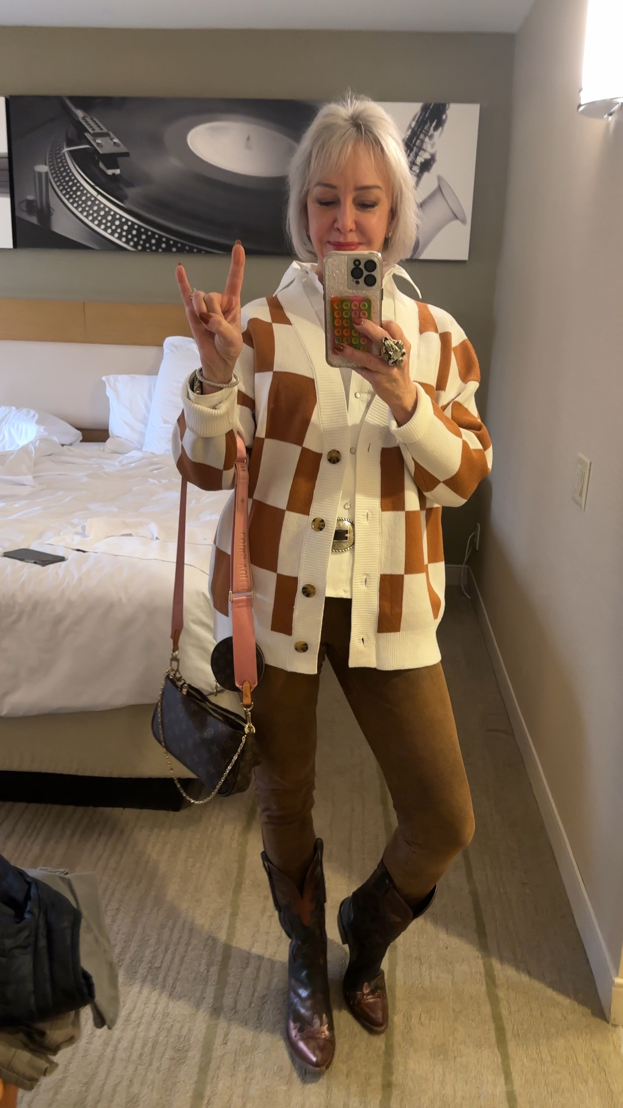 Fall style plus Longhorn game day look.
Checked cardigan sweater with faux suede skinny pants. Concho belt and white western style shirt and cowboy boots for the full Texas look. 


#LTKstyletip #LTKfindsunder100 #LTKover40