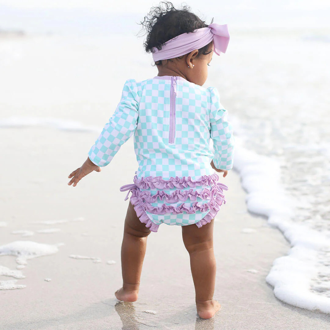 Long Sleeve Rash Guard With Ruffle Bottom | All Checked Out | Caden Lane