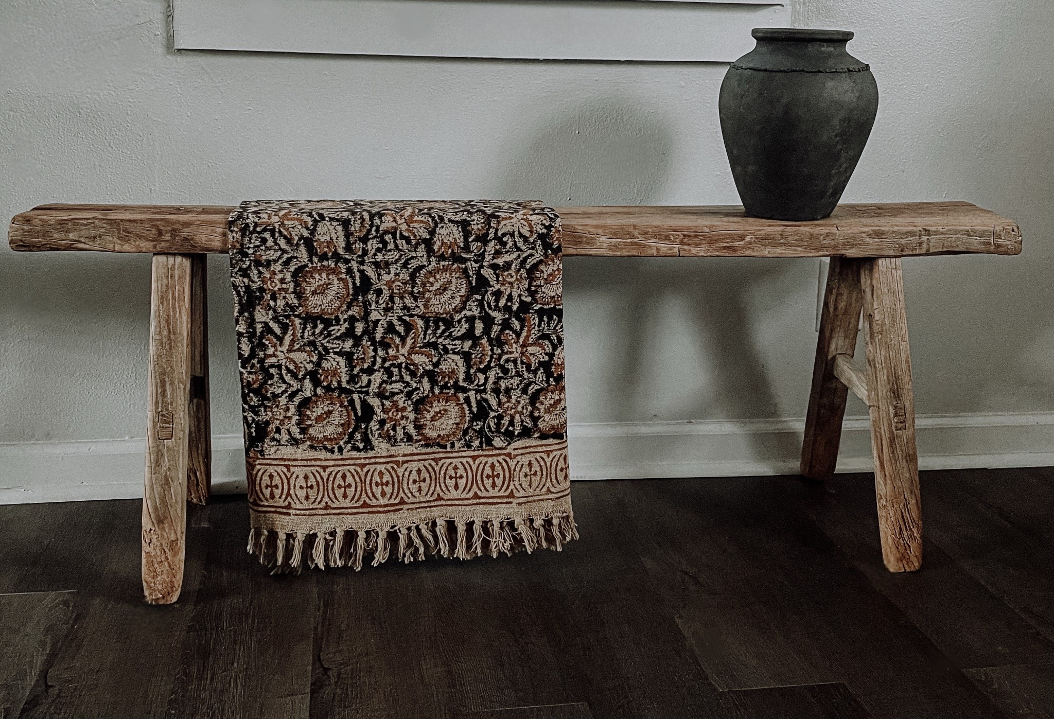 My favorite bench! You won’t believe where it’s from🤎 Also this throw is one of my favs too. I love the neutral moody tones in it. Vase is a DIY from Home Goods but linked similar🖤

#LTKHome