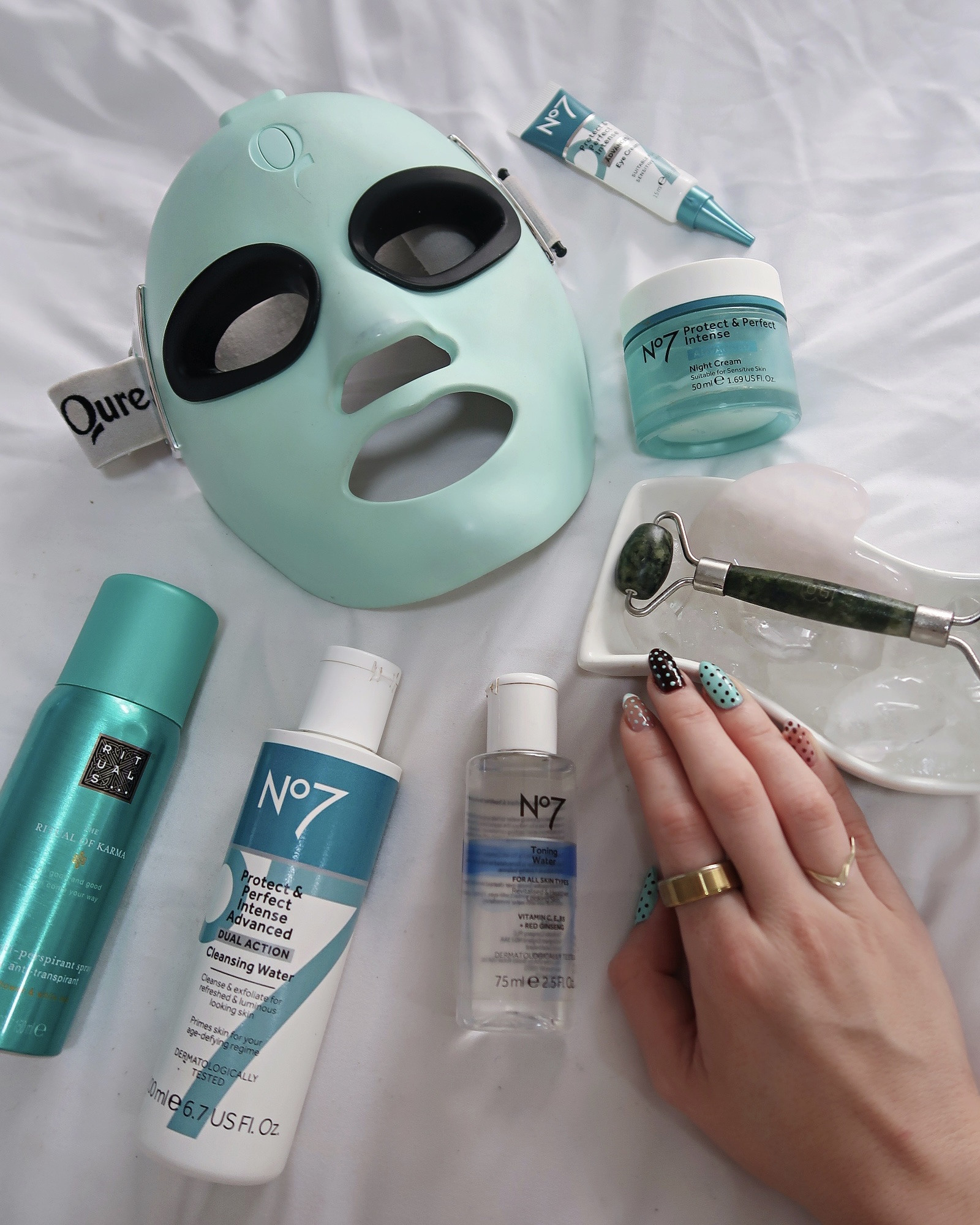 Qure red light mask, No7 Protect & Perfect, Rituals deodorant, jade roller, rose quartz gua sha, self care evening routine, flat lay skincare, skincare tools, evening pamper essentials, self care flat lay 

#LTKspring #LTKbeauty #LTKuk