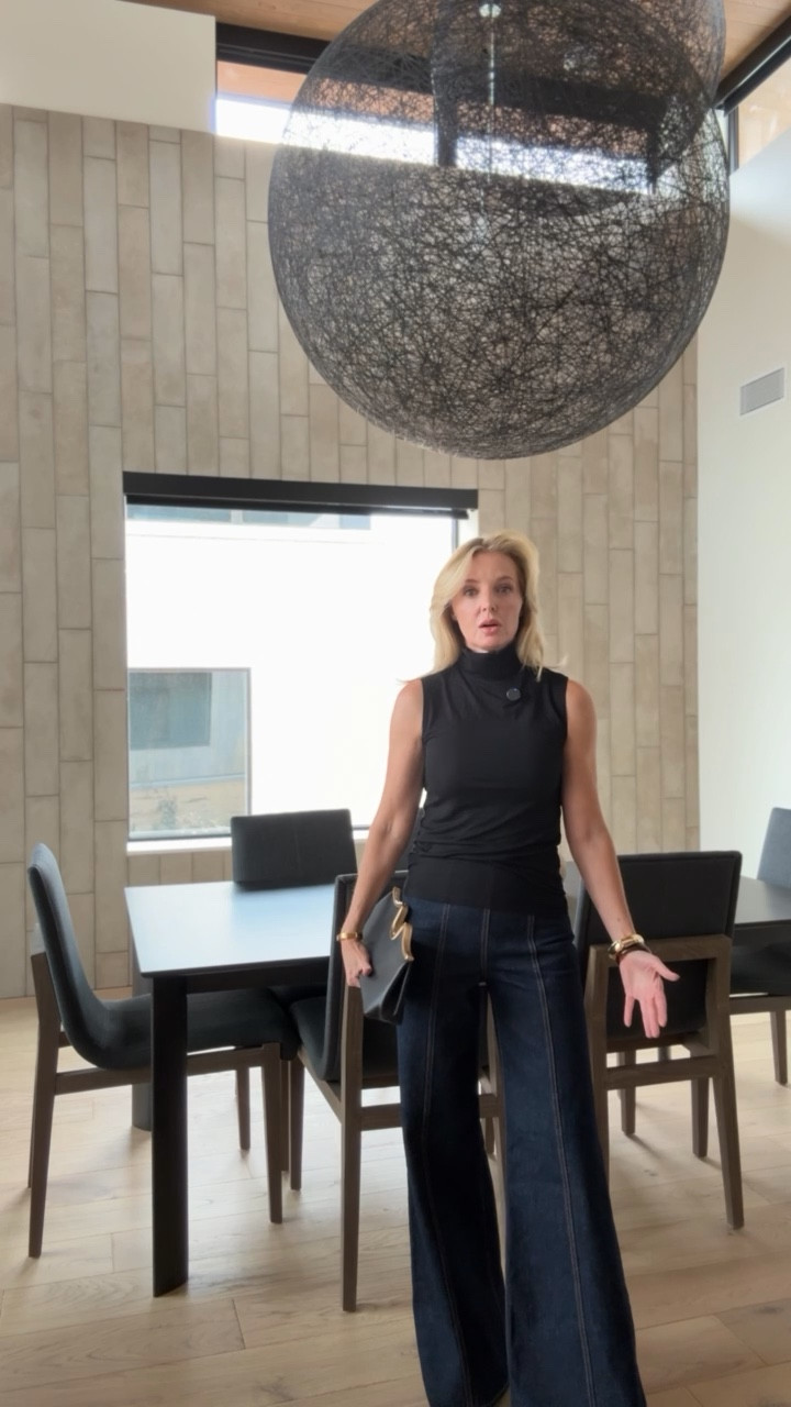 Sometimes simplicity is the sexiest choice, and that’s exactly what I love about the L’Agence sleeveless turtleneck. The high neckline elongates the frame and adds sophistication, while the sleeveless cut shows just enough skin. It’s a piece that feels refined but not stuffy—perfect for when you want to keep it low-key but still elevated. Paired with wide-leg jeans, the look is effortlessly modern. I’d finish this with simple gold bangle bracelets, a structured clutch, and a polished boot or heel. TTS. 

#LTKFindsUnder100 #LTKStyleTip #LTKSeasonal