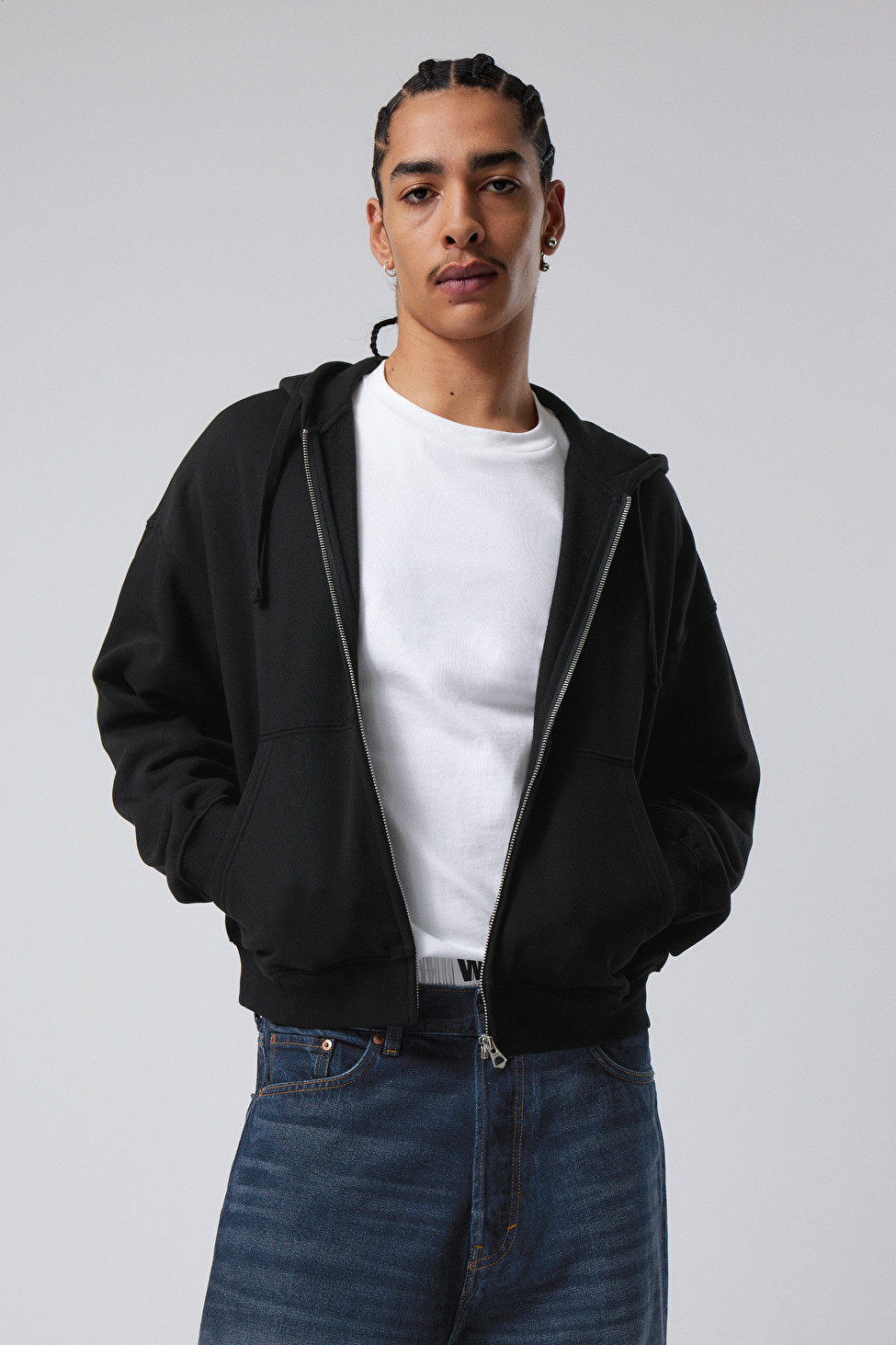 A boxy zip hoodie made from a soft cotton fleece jersey enhanced with recycled polyester. It has ... | Weekday