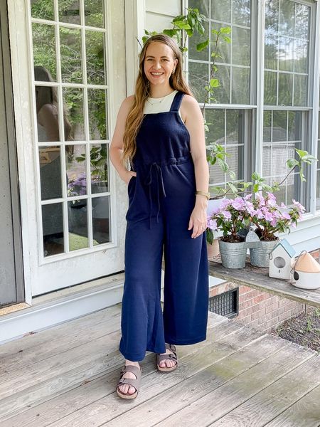 I linked several similar navy jumpsuits from Amazon as mine already sold out. High neck cropped white tank top and brown slide sandals are also from Amazon

#LTKfindsunder50 #LTKstyletip #LTKshoecrush