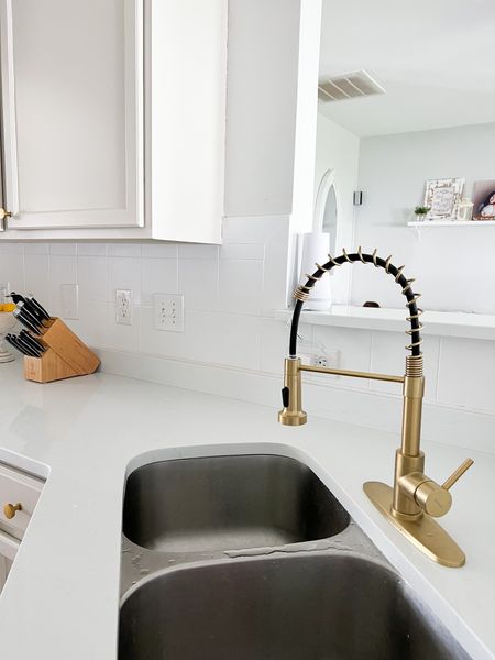 Kitchen sink
Kitchen faucet 
Brass gold fixtures 
Kitchen renovation 


#LTKhome #LTKstyletip