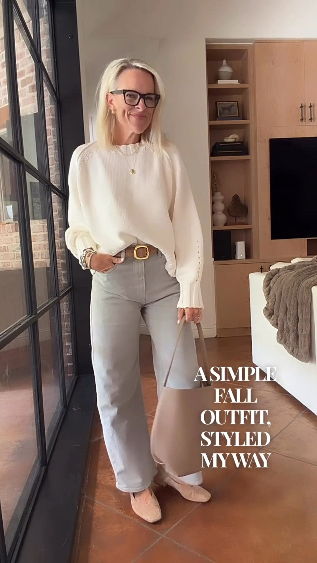 A simple fall outfit built around this soft cream sweater and light neutral denim. I love the subtle texture and feminine detail on the sleeves, it gives these everyday basics a little something extra while still feeling effortless.

Paired with a classic belt, neutral flats, and a simple tote for an easy, polished look. This is the kind of outfit I can see myself wearing on repeat all season.

#LTKootd #LTKgrwm #LTKOver40