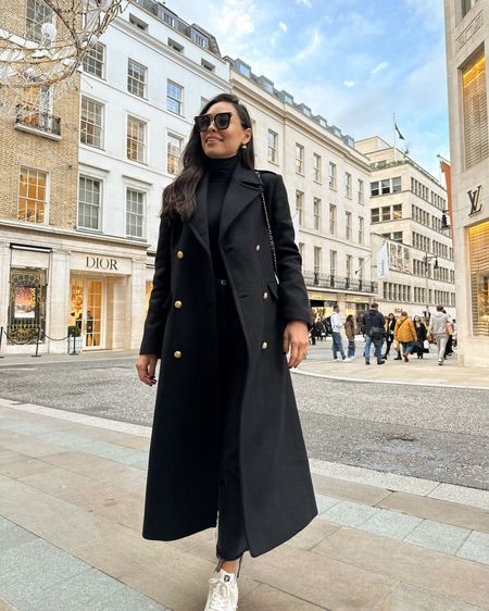 Kat Jamieson wears a black coat in London. Classic style, fall outfit, turtleneck. 

#LTKSeasonal #LTKworkwear #LTKHoliday