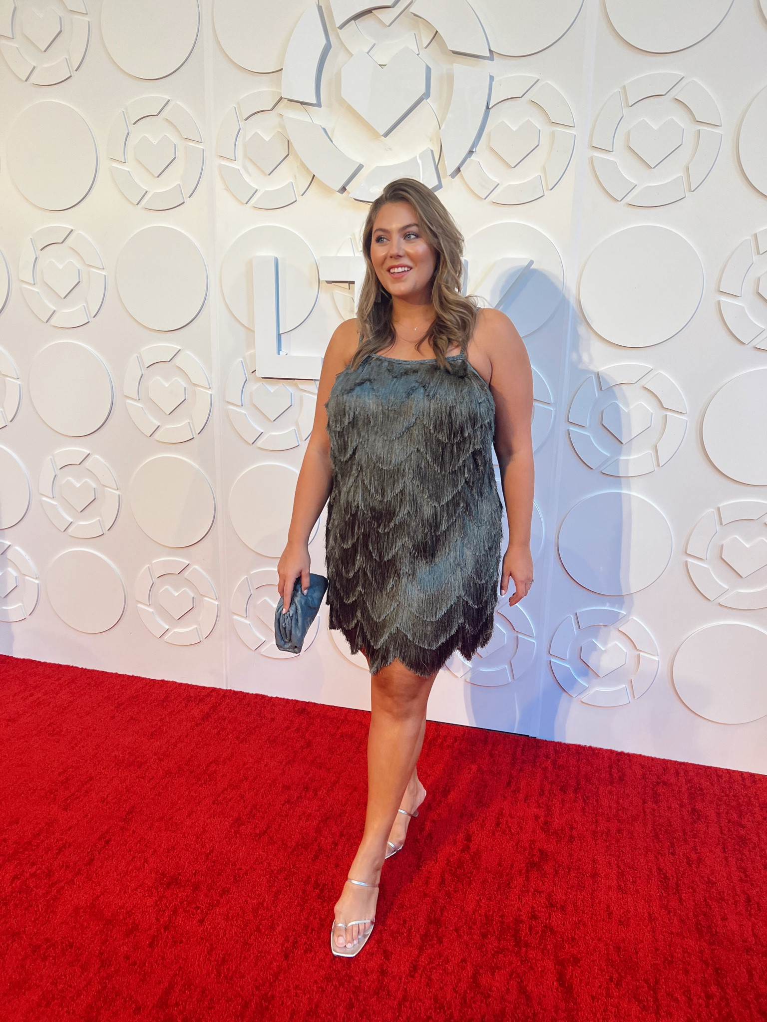 Wearing 1X in this fringe dress undergarments linked too 

#LTKcurves #LTKCon