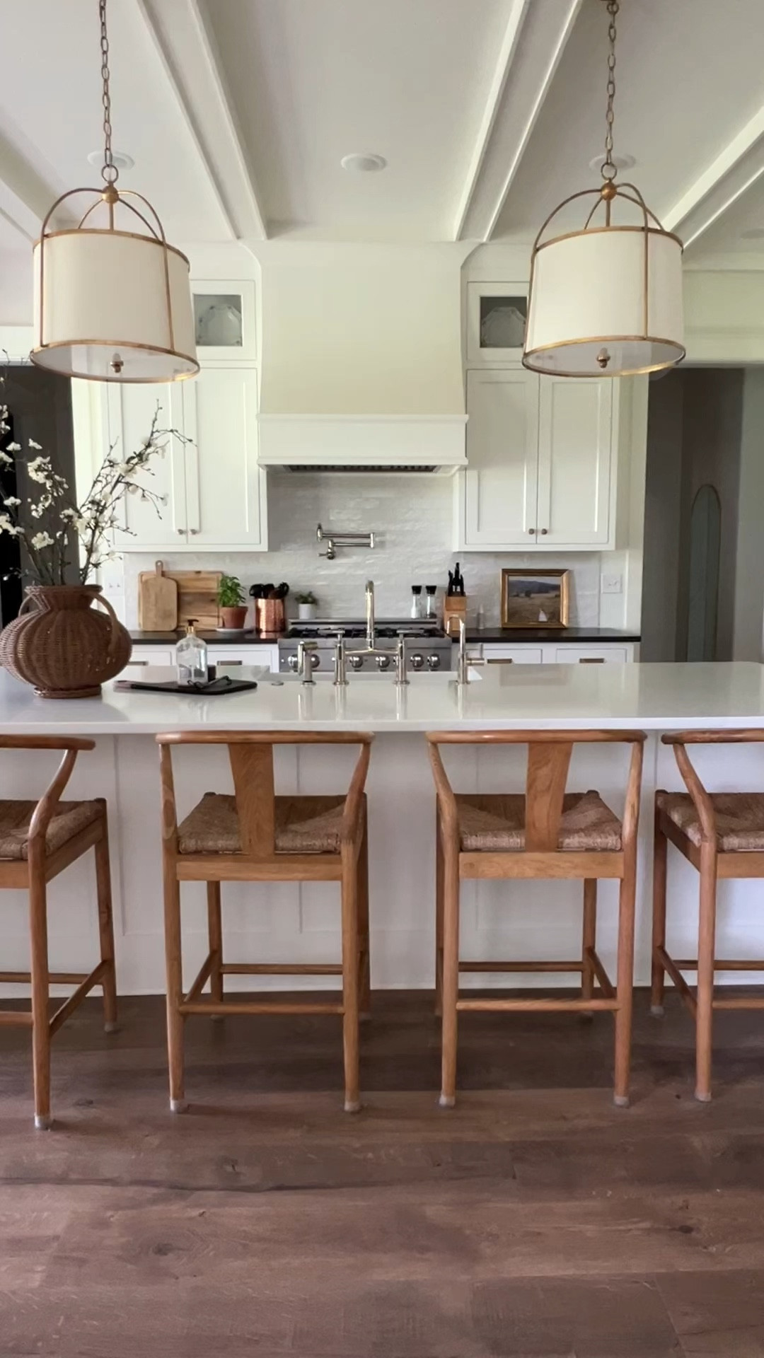 Classic White Kitchen: Bright, Warm, and Timeless ✨

I wanted this kitchen to feel bright, classic, and full of warmth. White is such a popular kitchen color, but to keep it from looking too plain, we added some special touches! The counters around the edge are a honed black quartz, which adds contrast, and the backsplash has a little shine to keep things interesting. We mixed metals with polished nickel and gold finishes, and brought in warm wood for the open shelves and bar stools. For a clean look, we chose inset cabinets that look a bit like furniture, and a sloped hood to soften the lines in the room.

#ClassicKitchen #beautifulkitcheninspiration #WhiteKitchenDesign #KitchenDecor #TimelessStyle #HomeInspiration


#LTKVideo #LTKHome