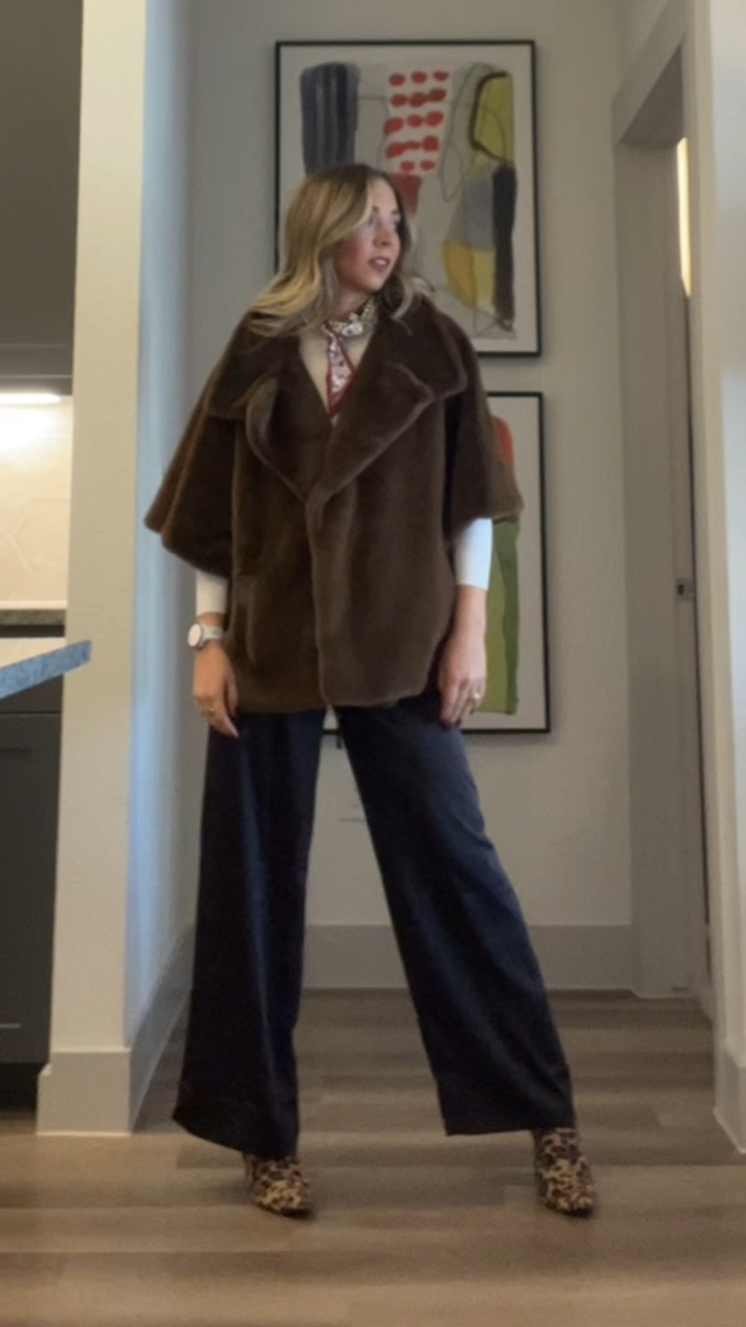 Layering up for a chilly work day! Leopard booties, brown satin pants, white ribbed long sleeve, and topped with brown faux fur oversized vest

#LTKWorkwear #LTKSaleAlert #LTKGiftGuide