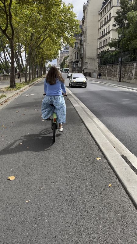 Paris France, what to wear in Paris, cashmere sweater, Liberty dress, floral dress, floral midi dress, what time wear in paris in the summer, bike riding in Paris, white sneakers, white leather sneakers

#LTKeurope #LTKSeasonal #LTKtravel