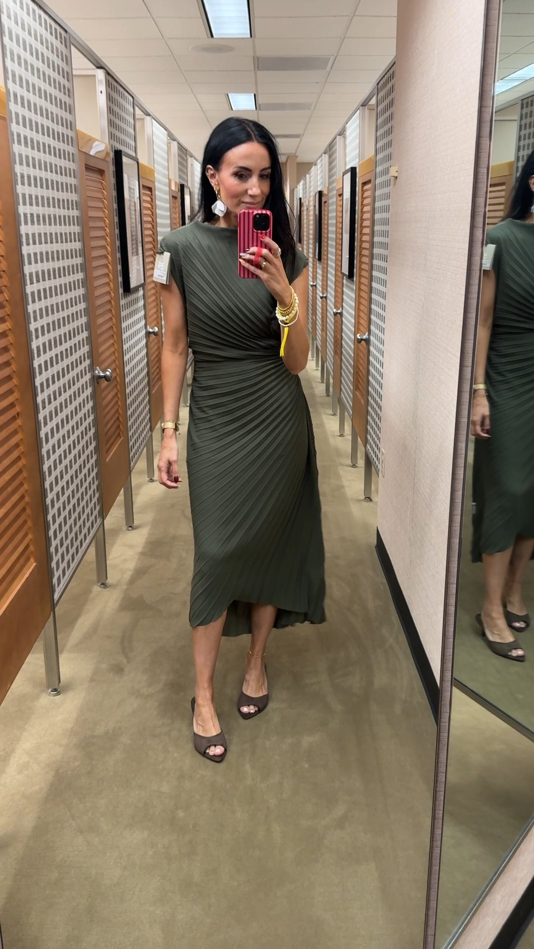 It is tts on this dress. The layers were a little tricky to get into. It’s two dresses in one.