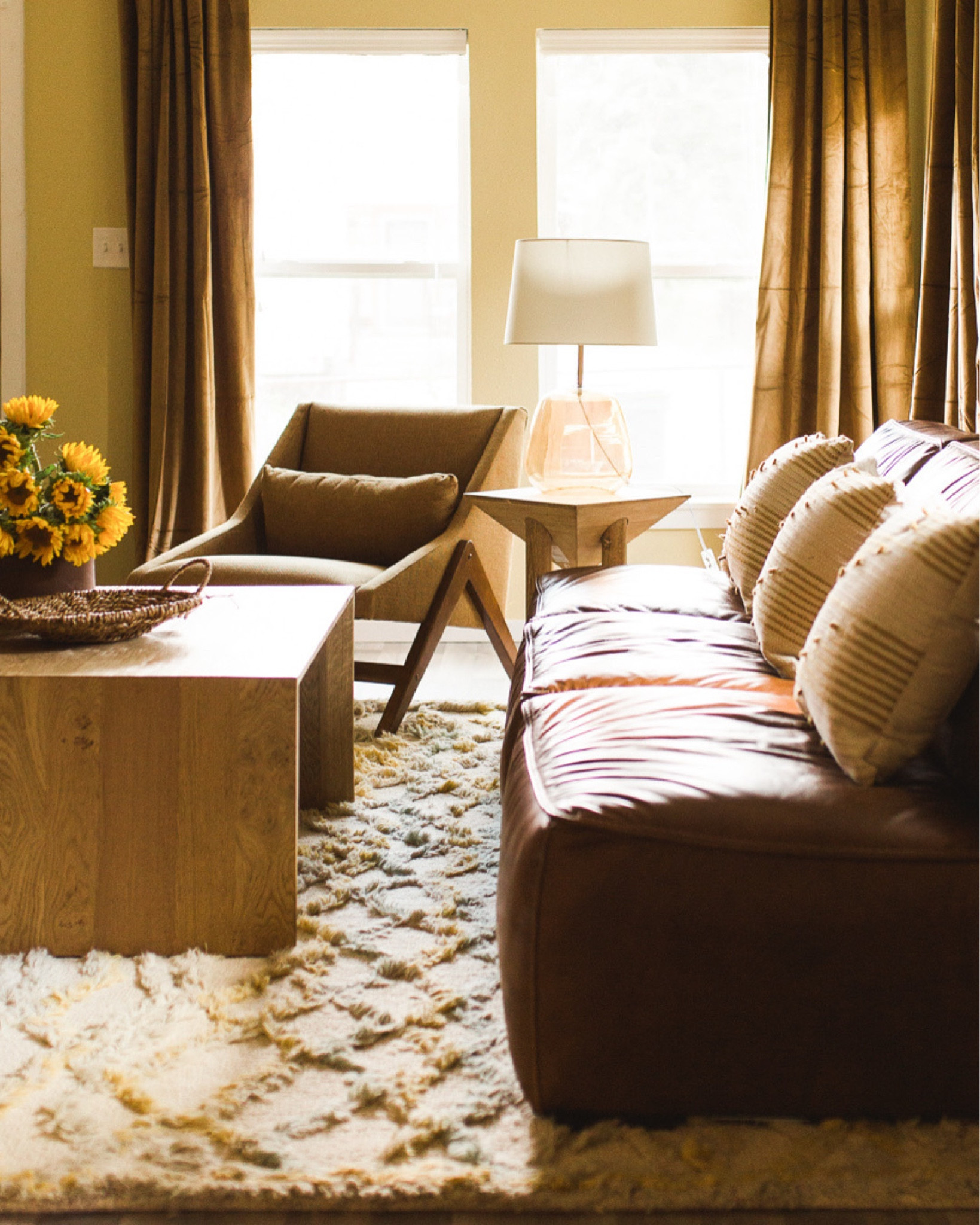 Cozy, texture-heavy living room that’s giving a modern 70s vibe

#LTKStyleTip #LTKFamily #LTKHome
