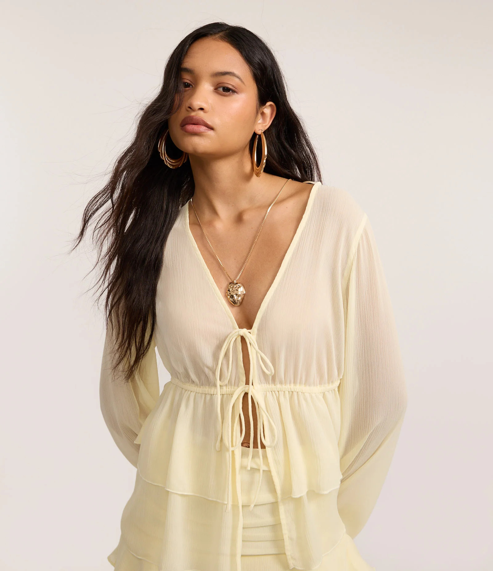 Blusa com Amarração Frontal e Manga Longa Ajustada Amarelo - Lojas Renner | Renner (BR)