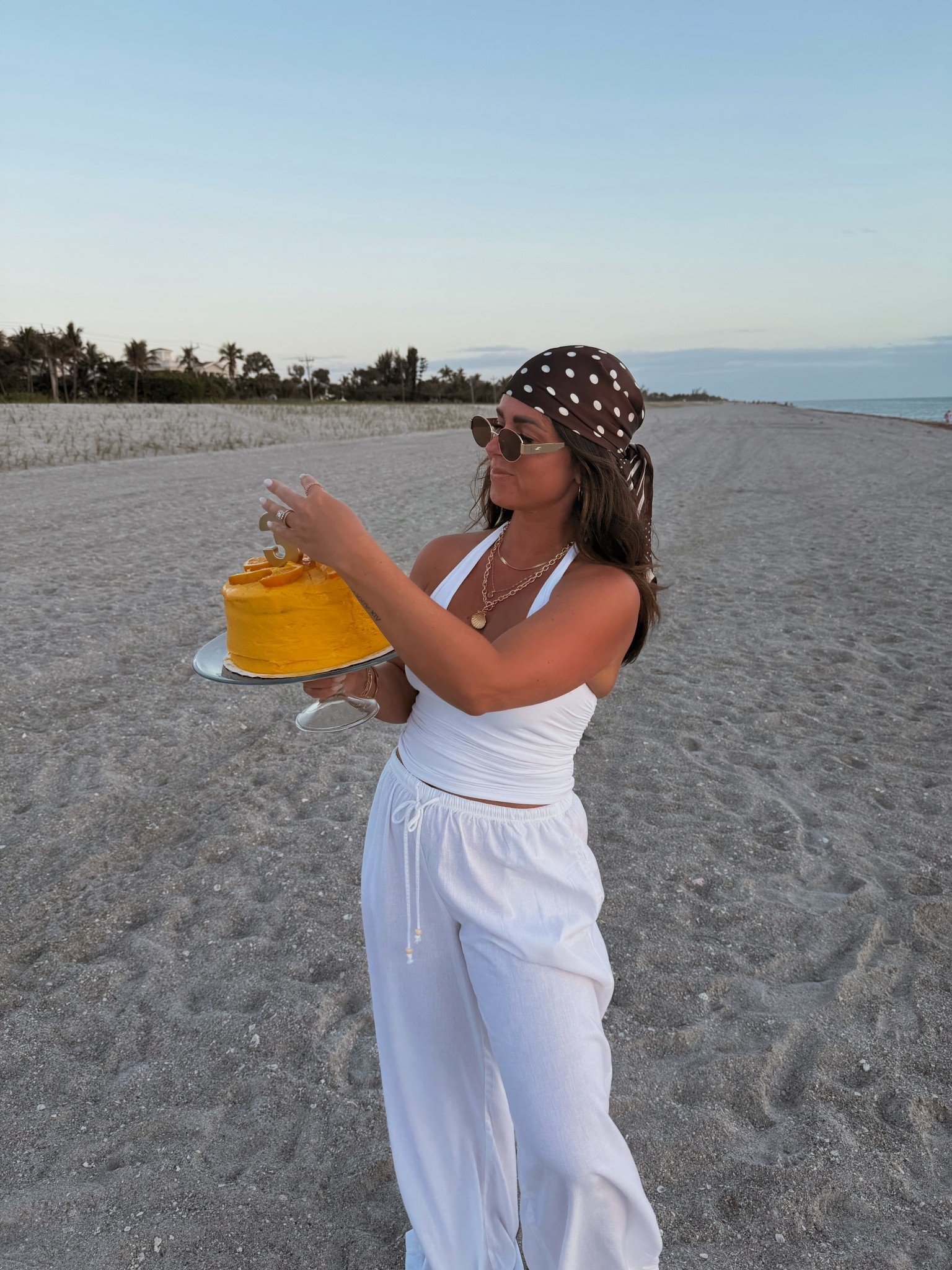 Birthday on the beach 🧡🍊 all white outfit - linen pants and halter top 

#LTKTravel #LTKgrwm #LTKootd