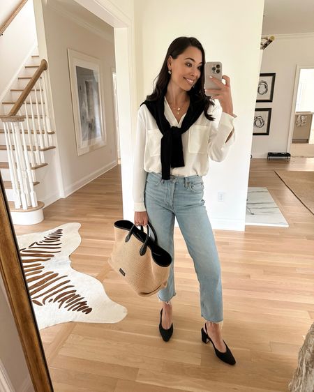 Kat Jamieson wears a classic outfit. Denim, jeans, Chanel slingback pumps, blouse, raffia tote. Spring outfit. 

#LTKSeasonal #LTKshoecrush #LTKitbag