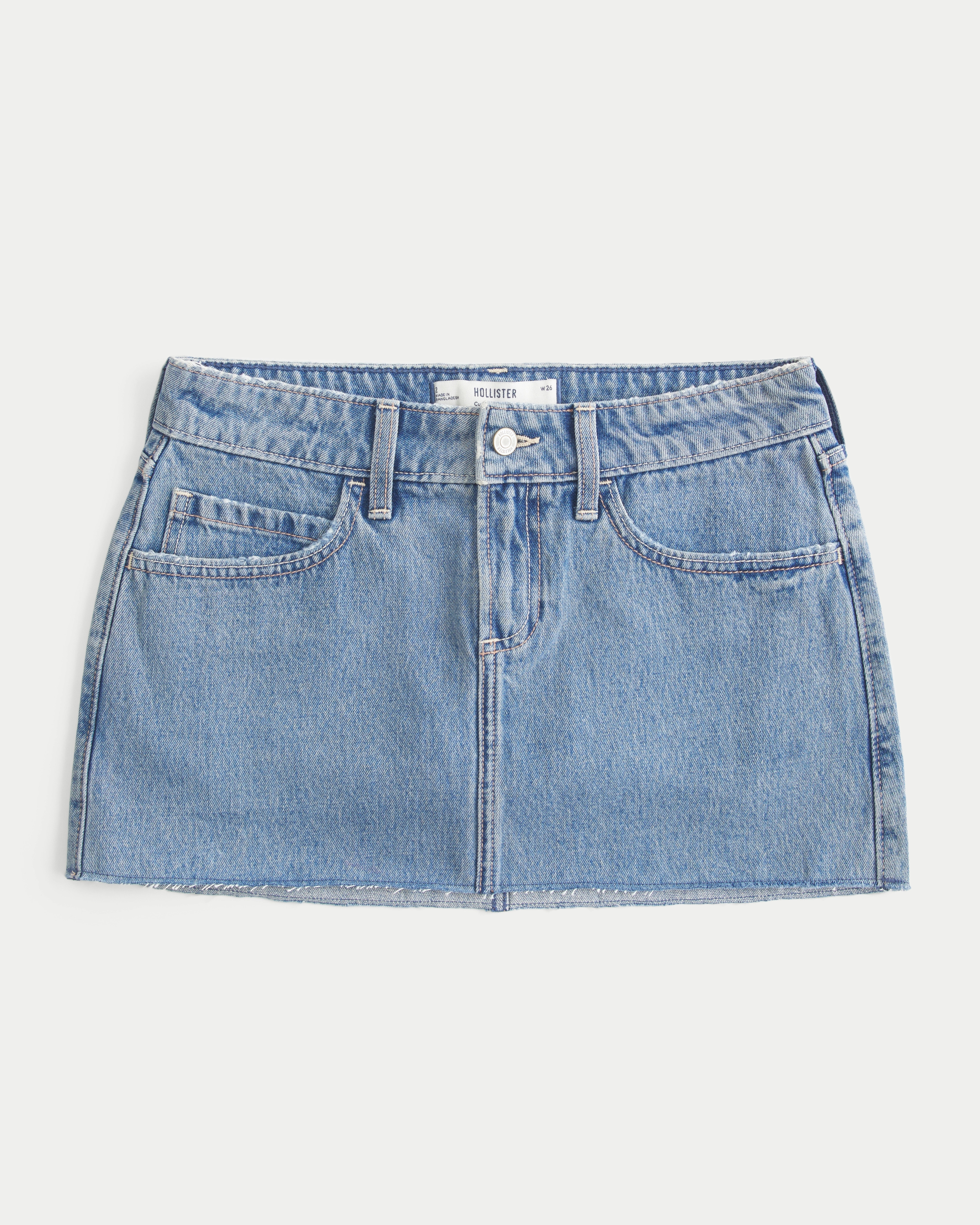 Curvy Low-Rise Medium Wash Denim Mini Skort | Hollister (US)
