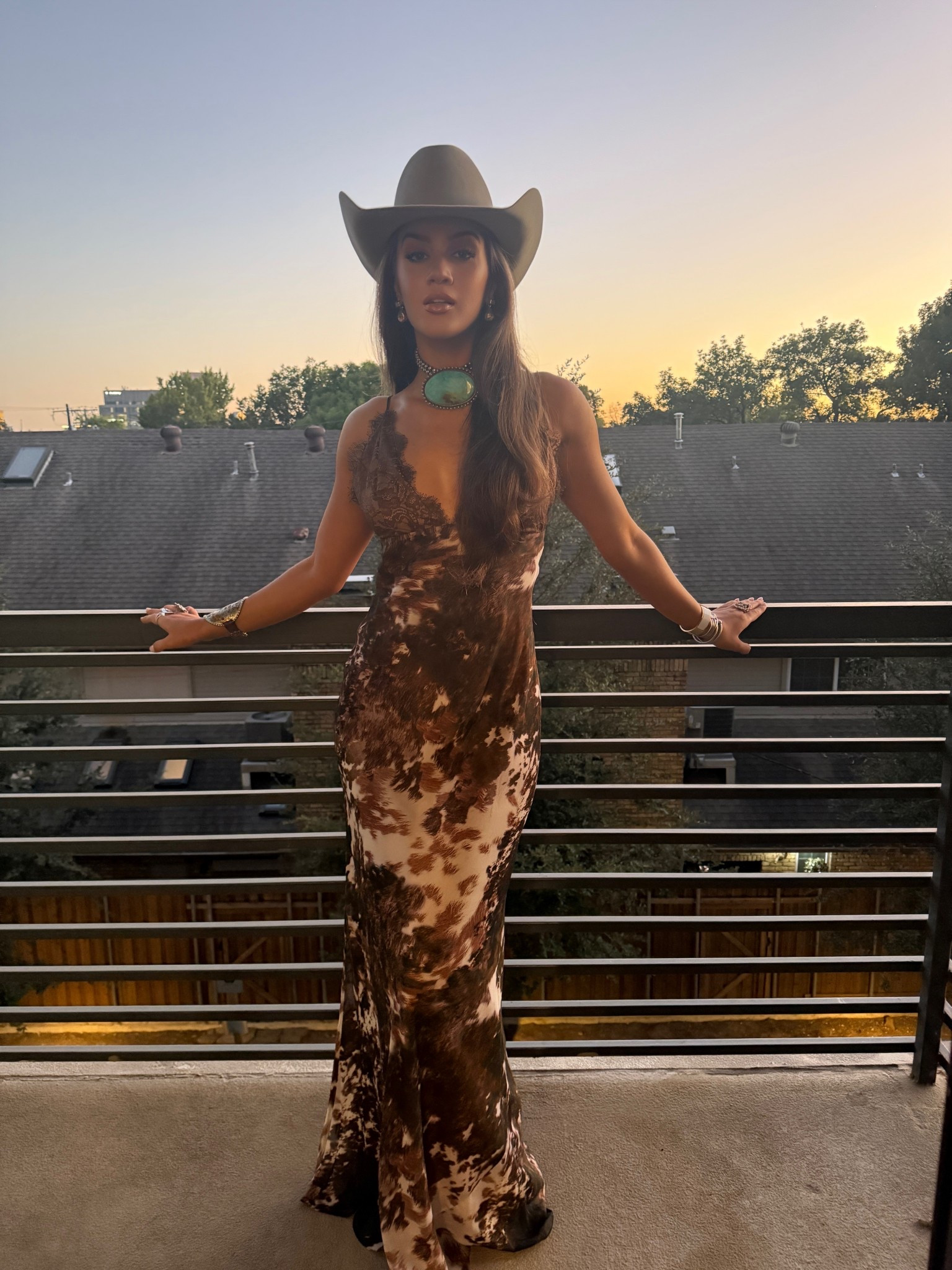 Cowgirl Carlye loves a cowhide print! Especially a gown! NOW ON SALE! One of my favorite outfits ever… the most beautiful silk gown… perfect for western black ties or even pair with a jacket and boots for a more casual look! True to size 🤠