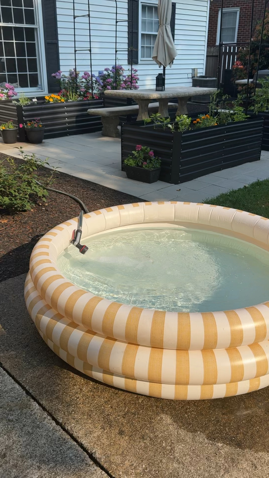 inflatable pool! they don’t make the yellow anymore but the green is so cute 