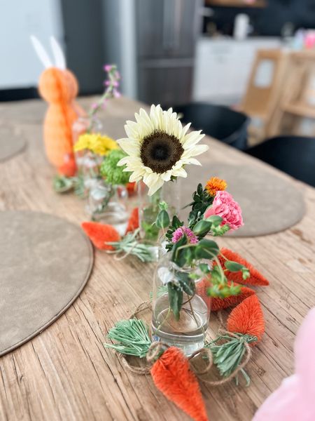 Simple Easter center piece. I love these little glass vases that I can use each season! 🌸  

#ltkeaster #easter #centerpiece #carrotgarland #freshflowers

#LTKSeasonal #LTKhome #LTKstyletip