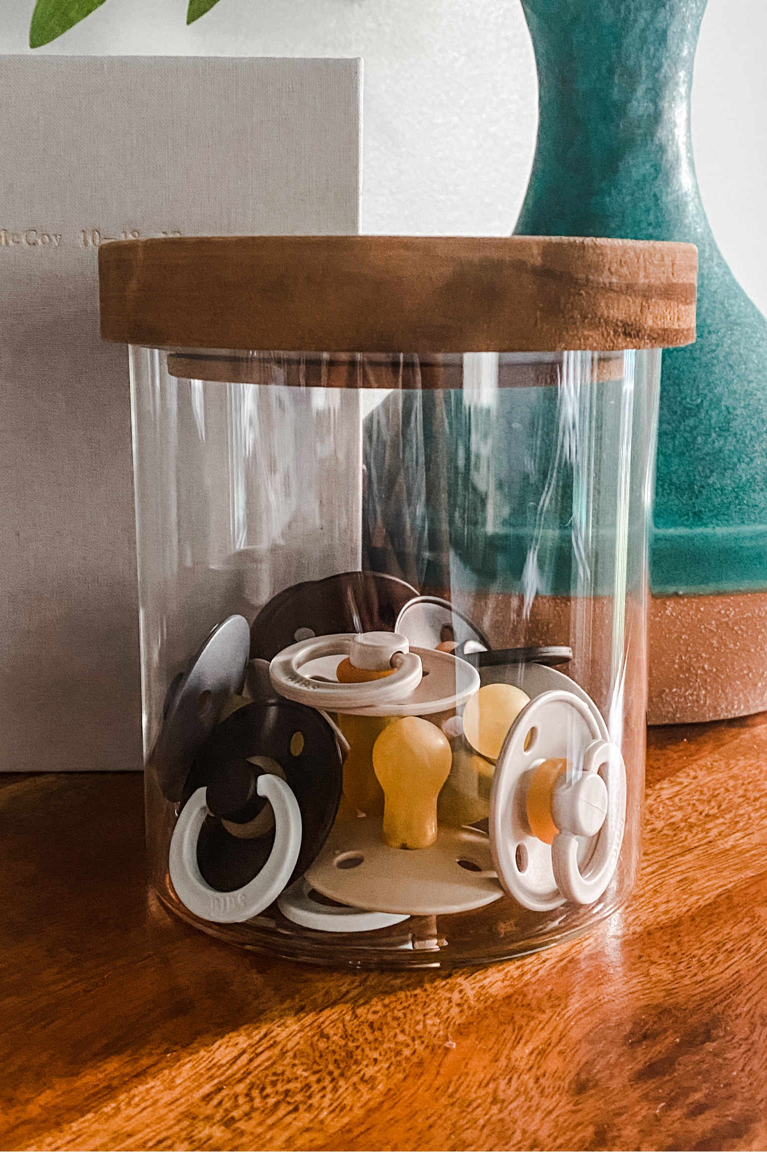 My boys were paci lovers and we were constantly looking for their favorite Bibs paci’s around the house. With our second, we finally bought this glqss storage container to keep them handy and ready to grab when needed. Keep it in the nursery or the kitchen for those desperate times and it still looks presentable sitting out. We loved filling ours up with the glow in the dark options to make night time soothing a little quicker and easier. 

#LTKGiftGuide #LTKBaby #LTKStyleTip