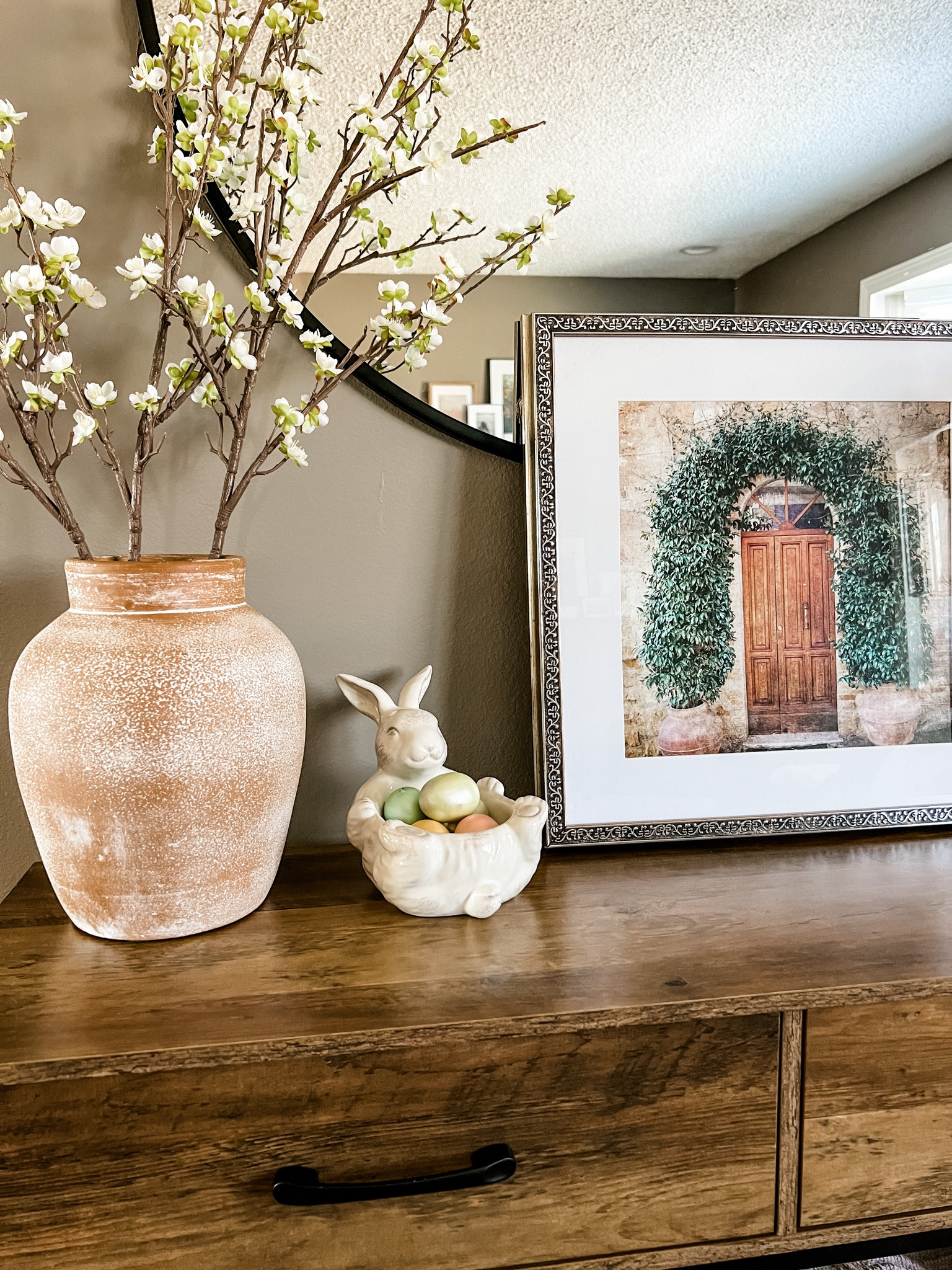 Easter console table decor 

Entry table, textured vase, bunny bowl, framed art, spring artwork, faux stems 

#LTKFind #LTKhome #LTKSeasonal