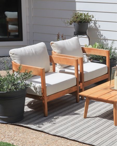Love our set of 2 curved wood outdoor patio chairs! Affordable, so comfortable, and have held up so well!

#LTKhome #LTKstyletip #LTKsalealert