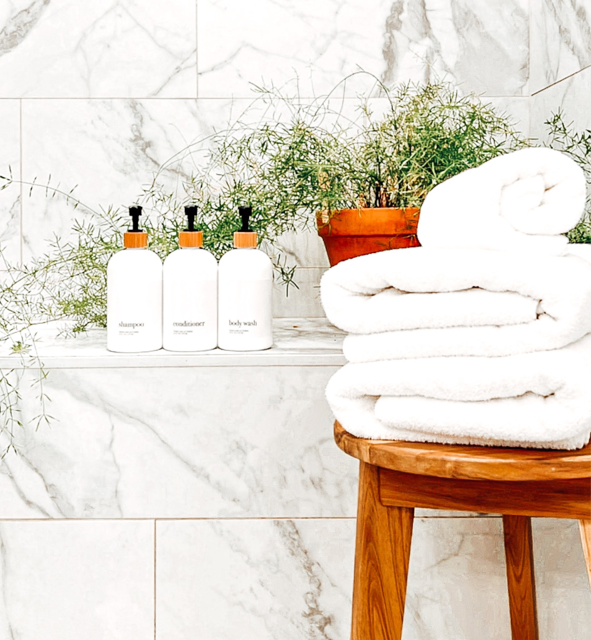 Spa vibes in the shower! I simply switched my old shampoo, conditioner and body wash bottles for these pre labeled bamboo trim bottles! #spa #bathroomdecor #simplify 

#LTKGiftGuide #LTKhome #LTKFind