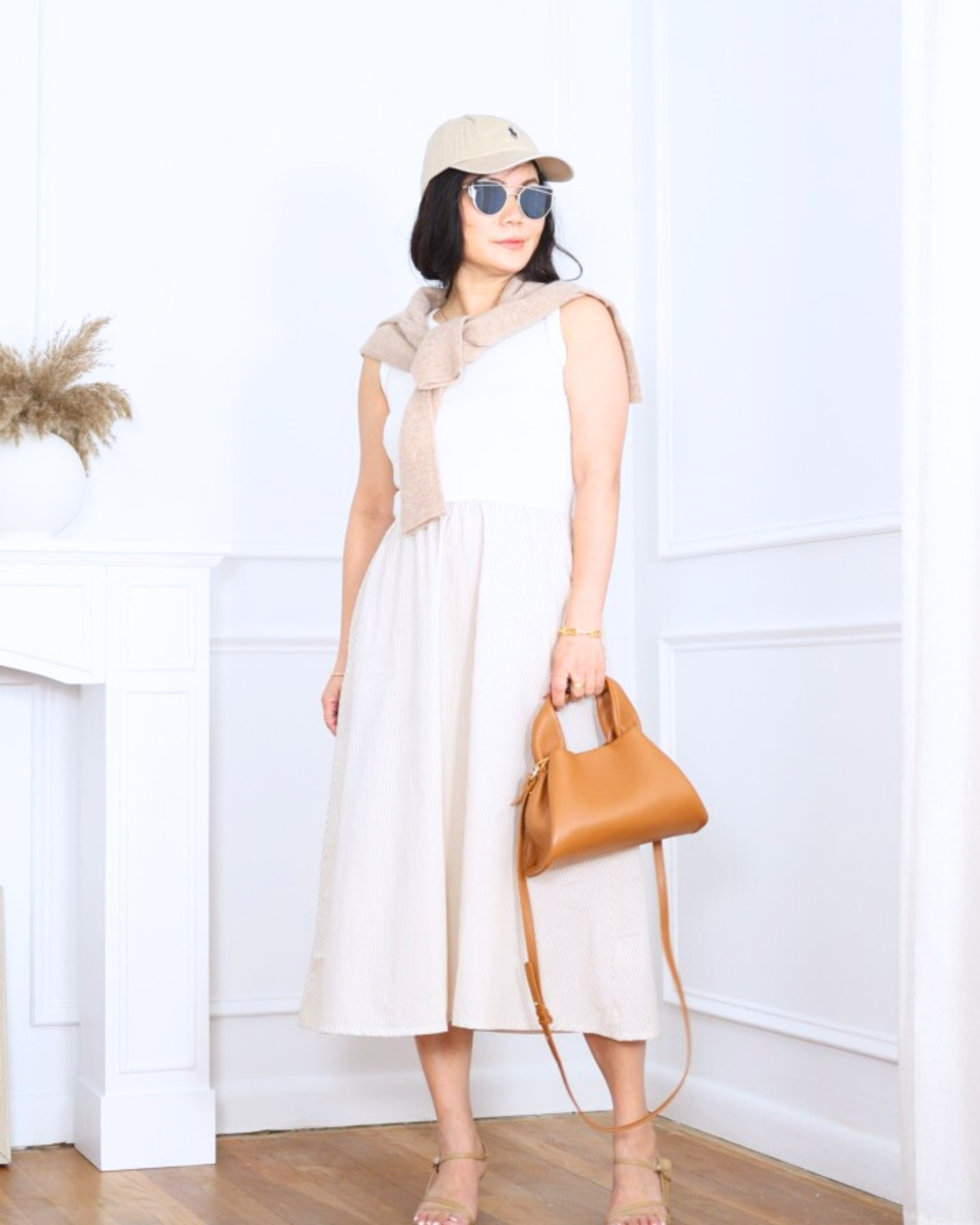 Mixed media dress from J.Crew Factory styled with a chino cap and a sweater draped over the shoulders, finished with a Quince bag and heeled sandals — relaxed, playful, and effortlessly put together. I’m 5’2, wearing size XS.

#LTKOver40 #LTKPetite #LTKootd