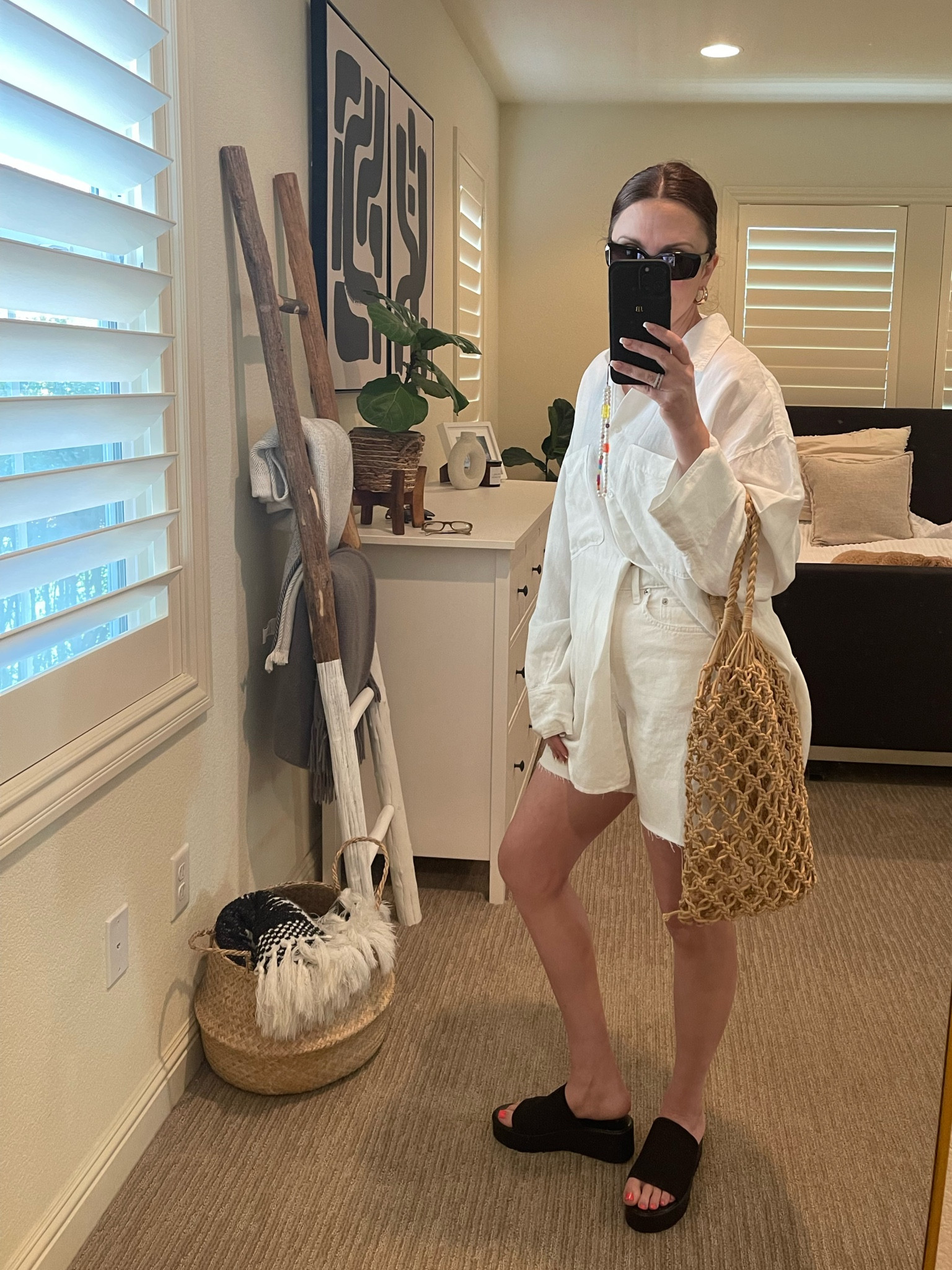 All white look 🤍 perfect for summer days 
Oversized linen blend shirt (wearing L) , high waisted white shorts, platform slides and rope bag & sunglasses 

#LTKstyletip #LTKitbag #LTKFind