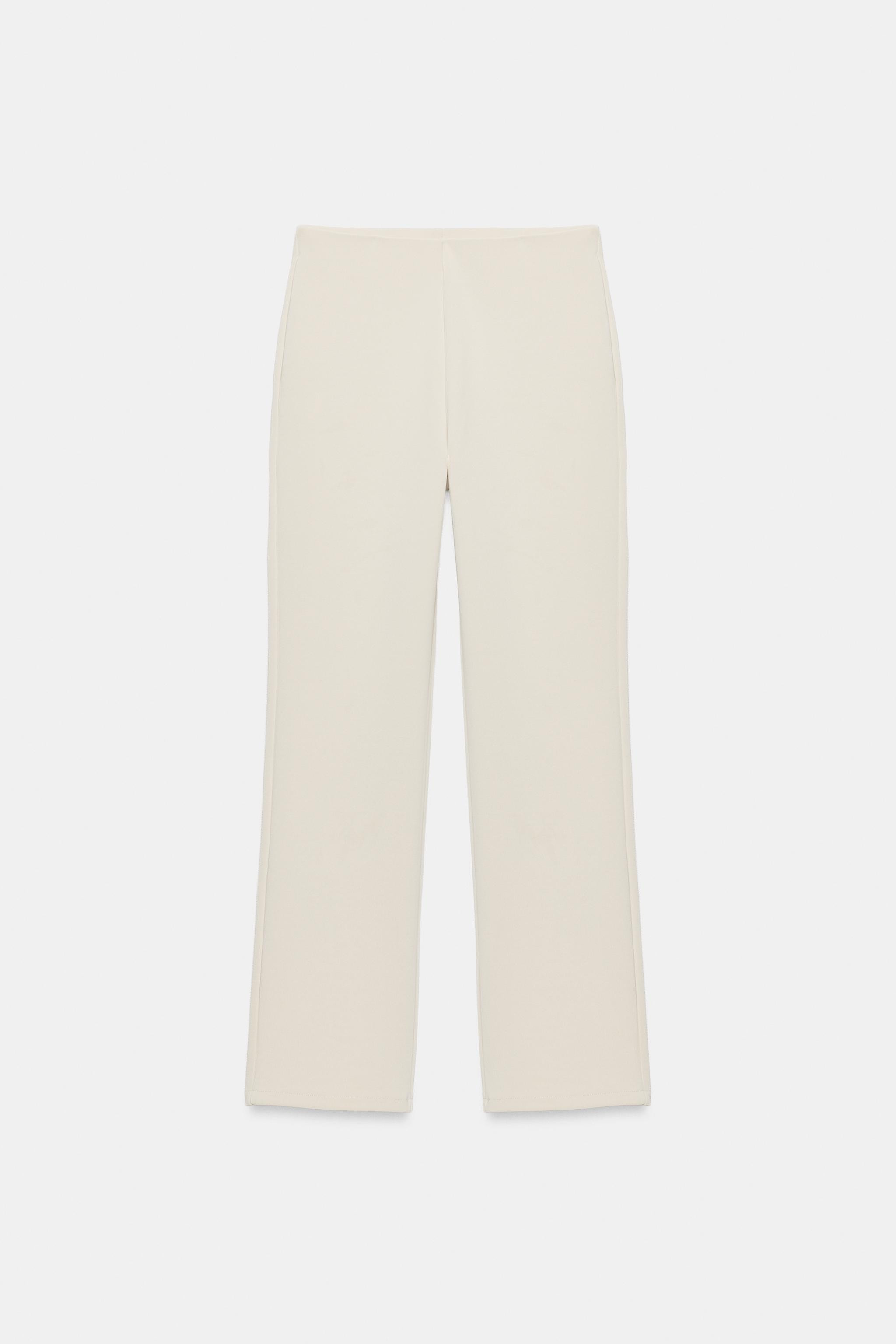 Mid-waist trousers with an elastic waistband. Patch pockets. Slim fit leg. | Zara UK
