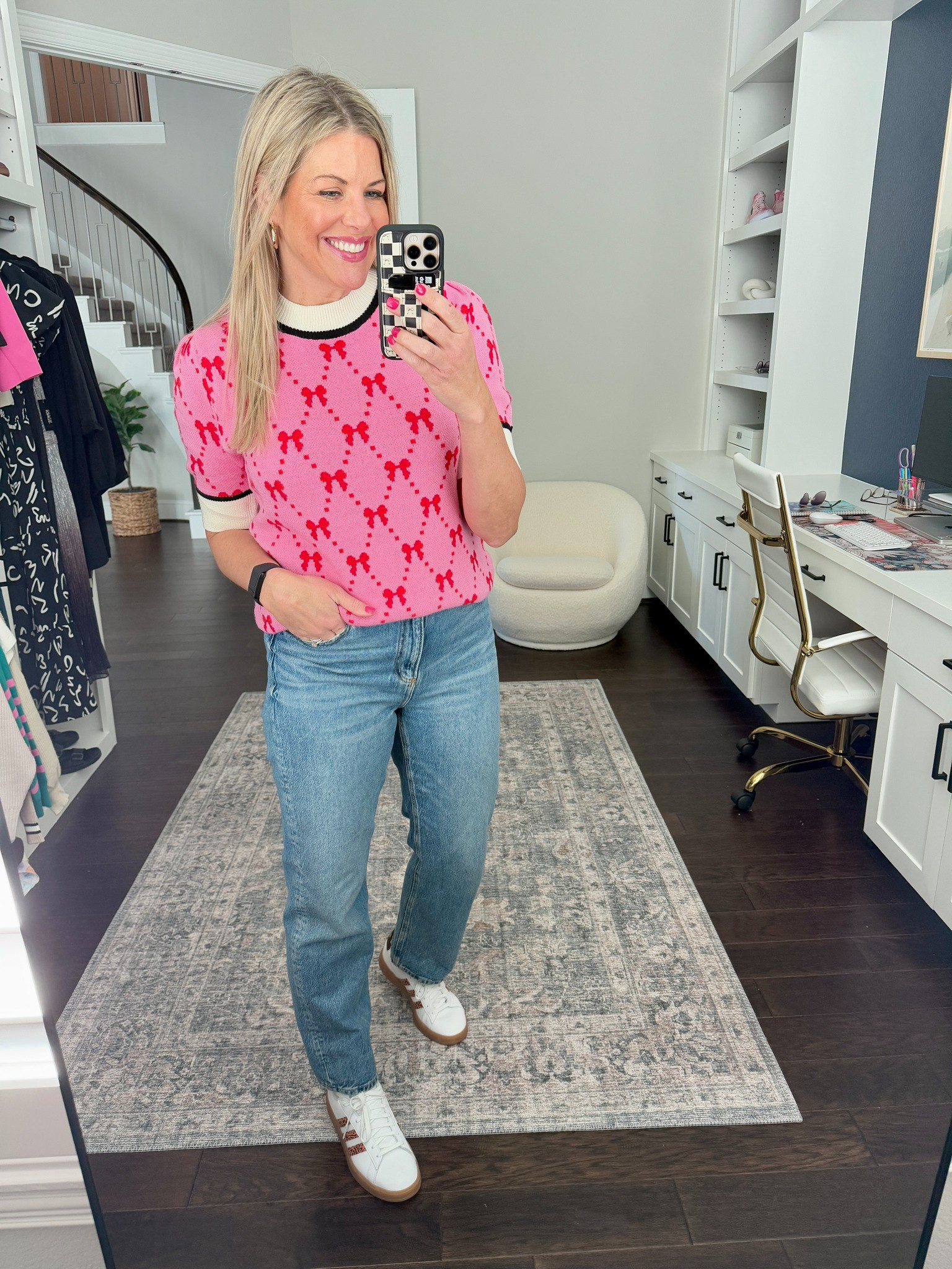 How cute is this sweater for Valentine's?! 💗 I'd recommend sizing down one size in it as it runs big.  

 #LTKootd #LTKSeasonal #LTKOver40