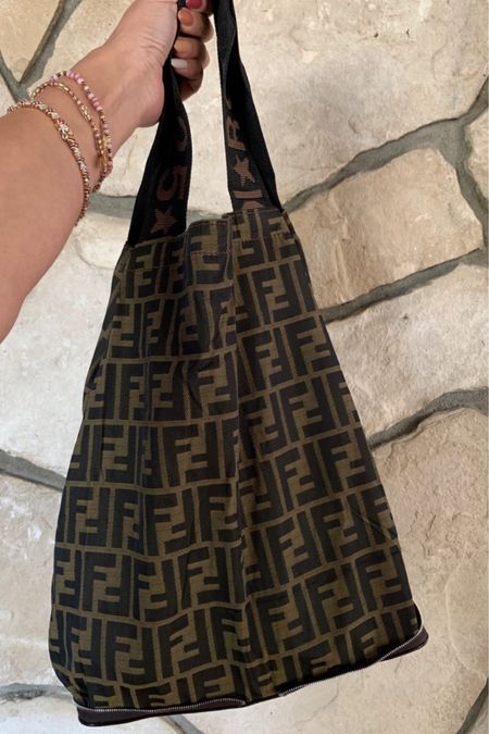 This foldable fendi tote is one of my favorite second hand designer finds. It’s practical, trendy a d the perfect sporty luxe bag  