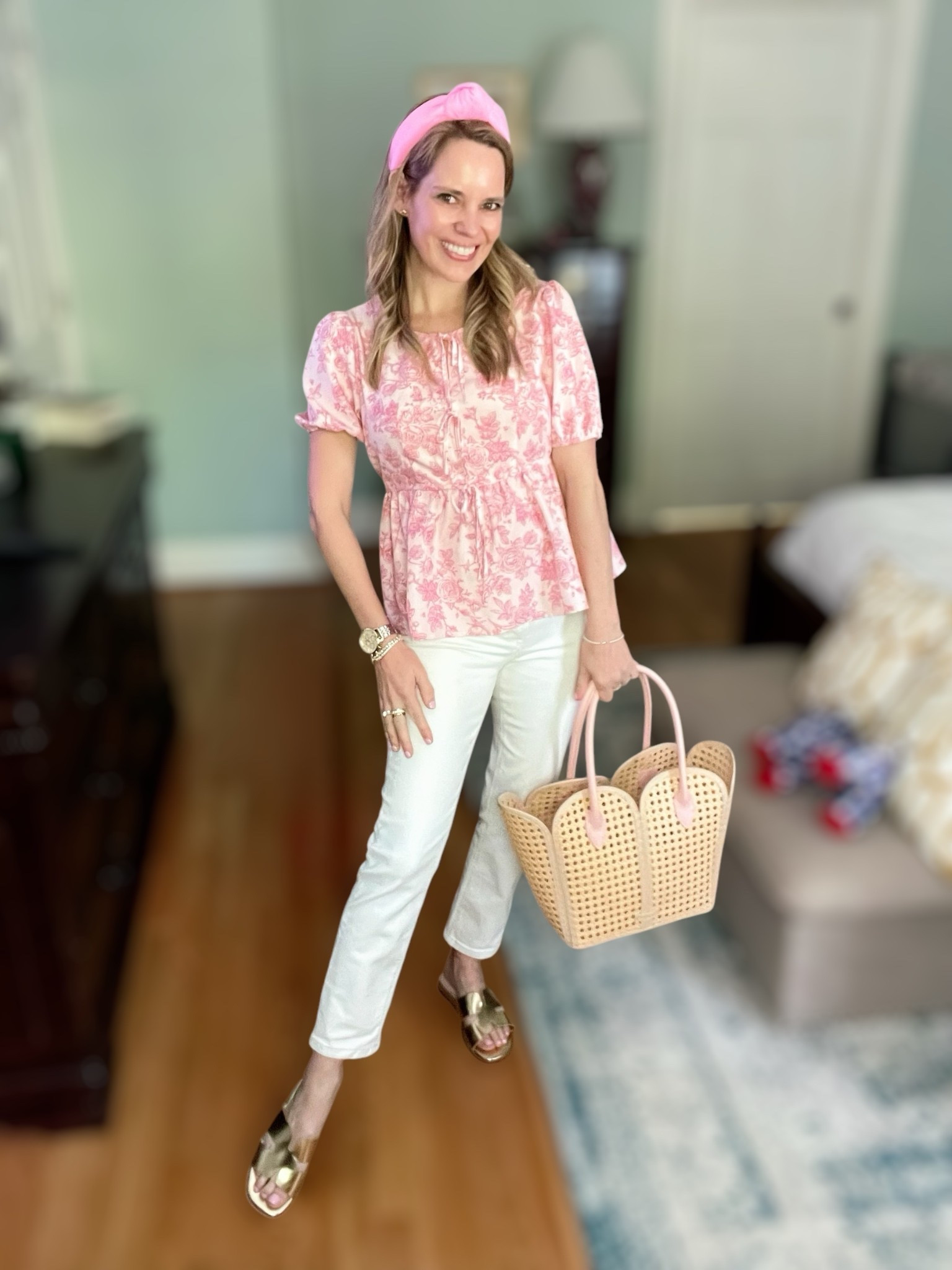 ASHLEYBA for 10% off Melinda Maria + free 1” diamondette hoops with $115 purchase through 4/15 ✨💎

🌸 Pretty in pink and ready for sunshine! ☀️ This feminine spring outfit is the perfect mix of sweet and classic. I’m wearing a rose-print puff sleeve peplum top 🌹 that cinches at the waist for a flattering fit and pairs so well with crisp white straight-leg jeans 🤍👖.

I added a pink knotted headband 🎀 for a pop of color and carried a neutral woven scallop-edge tote with blush pink trim 👜—so cute and lightweight for warm weather days! My gold slide sandals 👡 are under $60 and super comfy for day-to-night wear ✨.

Topped it all off with my go-to Melinda Maria jewelry—stacked bracelets, dainty rings, and glam gold hoops 💫💍.

Style keywords:
spring outfit inspo 🌷, pink and white outfit 💗, feminine style 💕, preppy spring look 🎀, everyday spring outfit 🌞, Melinda Maria jewelry 💎, woven tote bag 👜, white jeans outfit 🤍, gold sandals 👡, puff sleeve top 🌸


#SpringStyle #MelindaMaria #WhiteJeans #PinkTop #WovenBag #GoldSandals #LTKSpring #PreppyStyle #AffordableFashion #LTKUnder100 #LTKJewelry

#LTKOver40 #LTKFindsUnder100 #LTKFindsUnder50