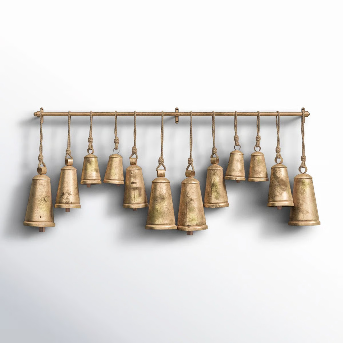Kristen Bronze Metal Tibetan Inspired Indoor Outdoor Decorative Cow Bells with 12 Bells on Jute H... | Wayfair North America