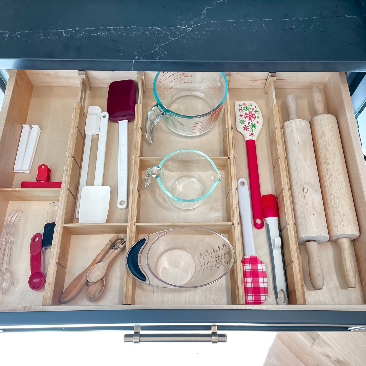 Holiday Bake Off Ready 🍪🥛

We love being intentional with how we unpack and create zones within a kitchen.  Supporting your cooking and baking routines so your belongings are kept together for the purpose they serve.   

This baking drawer is prepped for holidays goodies!  What is your signature Christmas Cookie?

We always make Chocolate Ribbon Cookies, Buckeye Balls, and Santa Cookies for Santa Claus! 🎅🏻 



#LTKSeasonal #LTKfindsunder50 #LTKhome
