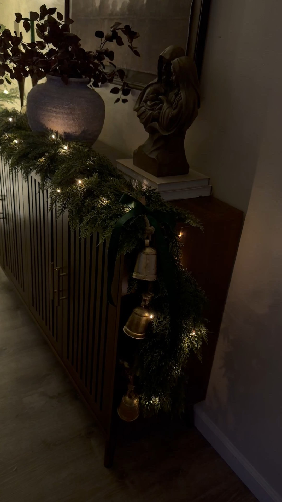 Buffet table styling 
Christmas styling 
Greenery 

#LTKHome #LTKHoliday #LTKSeasonal