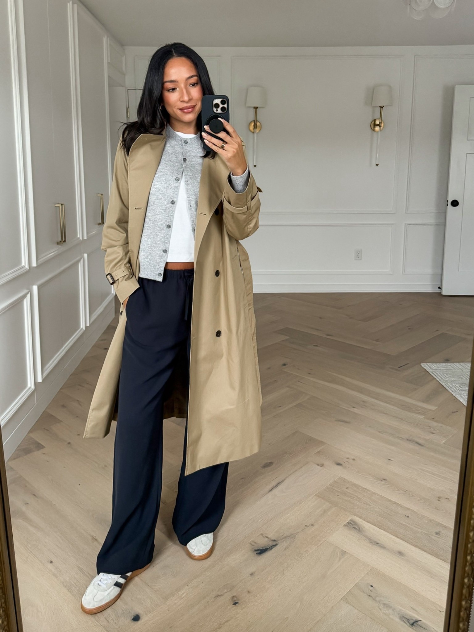 Rainy day casual fall outfit wearing my favorite staples 🤍 Wearing size S white tee (size up 1-2 sizes for an oversized look), size S cardigan, M navy pull on pants (sized up for the bump) and size S trench coat 

Work outfit 
Office outfit 
Workwear 
Fall outfit 
Fall fashion 
Wrinkle free pants 
Cardigan outfit

#LTKSeasonal #LTKWorkwear #LTKStyleTip