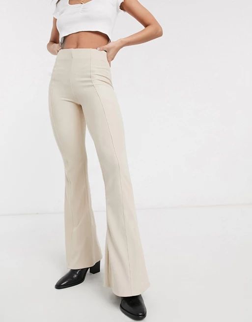 Bershka flared trousers with seam detail in beige | ASOS (Global)