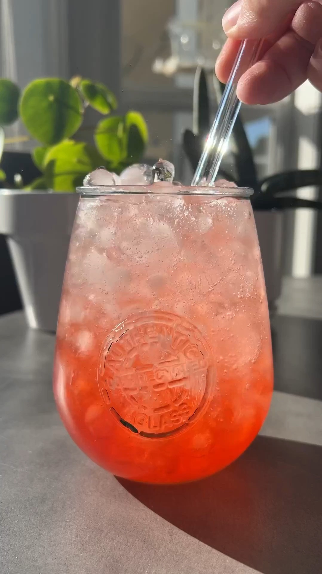 Blood orange vodka with tangerine sparkling water. Why does a pretty glass, with round ice cubes make every drink better? 

#LTKVideo #LTKHome #LTKFindsUnder50