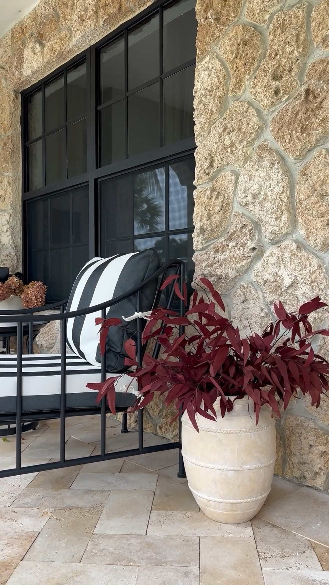 Fall porch decor. Switched out our cushions for striped. Added Fall dried florals. Deep burgundy in this beautiful terracotta pot and dried hydrangeas for the side table. 

Fall porch 
Porch decor
Fall patio 
Moody 
Stone wall 
Mediterranean 
Aubrey patio set
Walmart home
Amazon 
Cottage 
Pottery barn 
Magnolia 
McGee 
Autumn 
Patio set
Bistro set 
Black iron 
Black and white stripes 
Halloween 
Moody

#LTKSeasonal #LTKSaleAlert #LTKHome