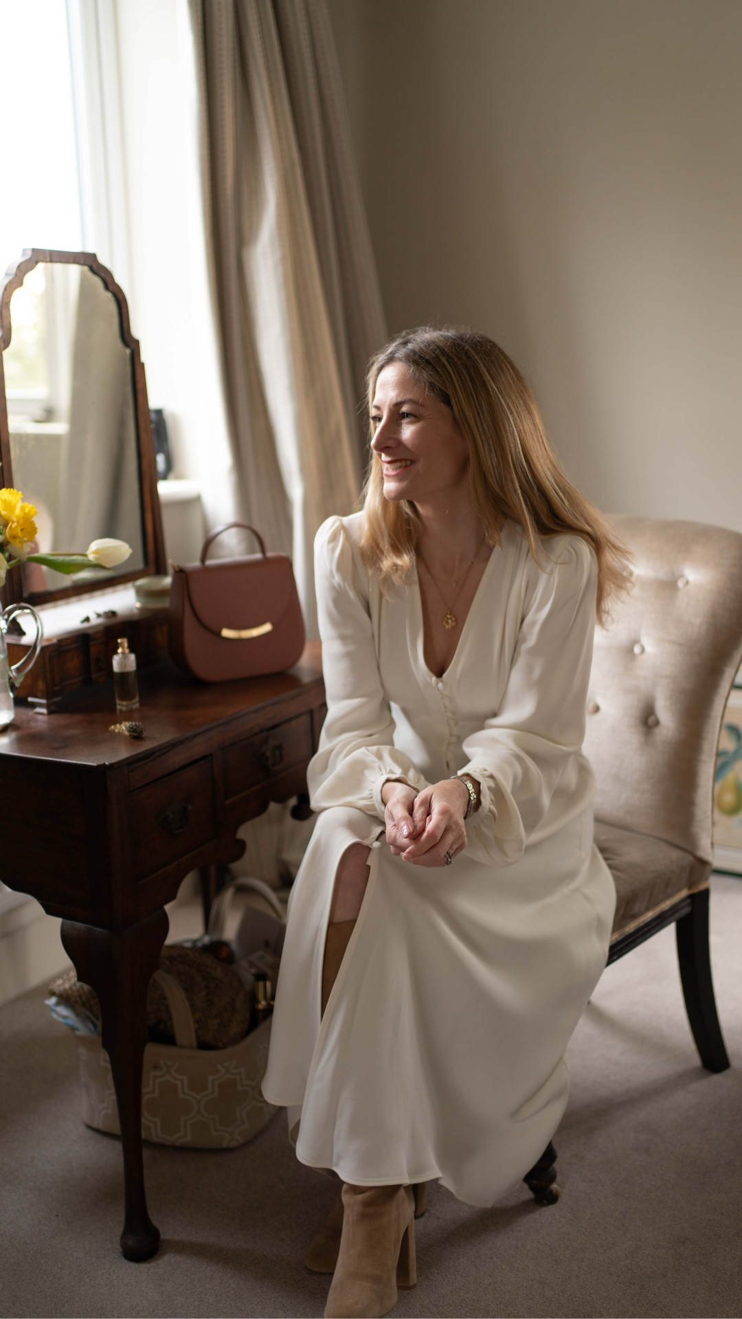 Valentine’s is a bit of a marmite celebration and I have to admit that I’ve been along side the naysayers complaining about the over-commercialism. But this year I’ve been reminded that celebrating each other and life is exactly what we should be doing.

It sent me drifting back through the different Valentine’s Days I’ve had over my 42 years.
Do you remember that teenage hope? Wishing beyond hope for an anonymous card from the boy who’d caught your eye — that tiny confirmation that he might just like you too, and had chosen this day of love to say it. The nervous excitement. The flutters in your stomach when you actually received something.
I remember making handmade cards, trying to pour all my feelings onto paper. I remember him travelling all the way up to Leeds to my student house just to cook steak with a homemade Diane sauce. I still have those cards somewhere. But more than that, I treasure the memories — and how those moments made me feel.

So this year, I shall be celebrating with bells on and I’ll be wearing this fabulous dress to do it, because it makes me feel utterly fabulous.

Details:
Dress is @ghostfashion ad/pr
Coat is @fairfaxandfavor 
Boots are old @mango 
Bag is @charlottelizbth 
Scent is @ffern.co winter 26
Jewellery @lulublondon 

Prev ad/pr included