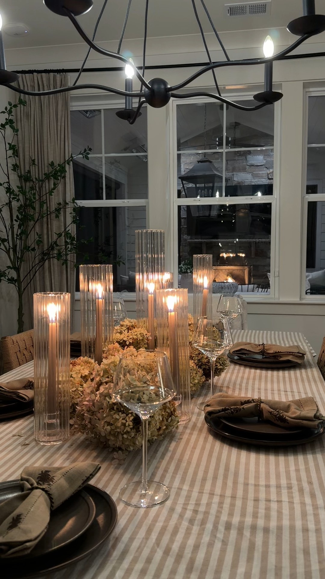 Candlelit Thanksgiving moments 🤎✨ This nighttime tablescape is my favorite — the tall ribbed glass candles, dried hydrangeas, and dark stoneware plates make everything feel so warm and intentional. Perfect for holiday hosting when you want that cozy, elevated glow. Linking the candles, plates, napkins, glasses, and table linens so you can recreate this exact setup for Thanksgiving or Christmas dinner.

#ltkhome #thanksgivingtable #holidayhosting #cozyhomevibes #tablescapestyling #neutraldecor #falltablescape #ltkholiday 

 #LTKHoliday #LTKSeasonal #LTKHome